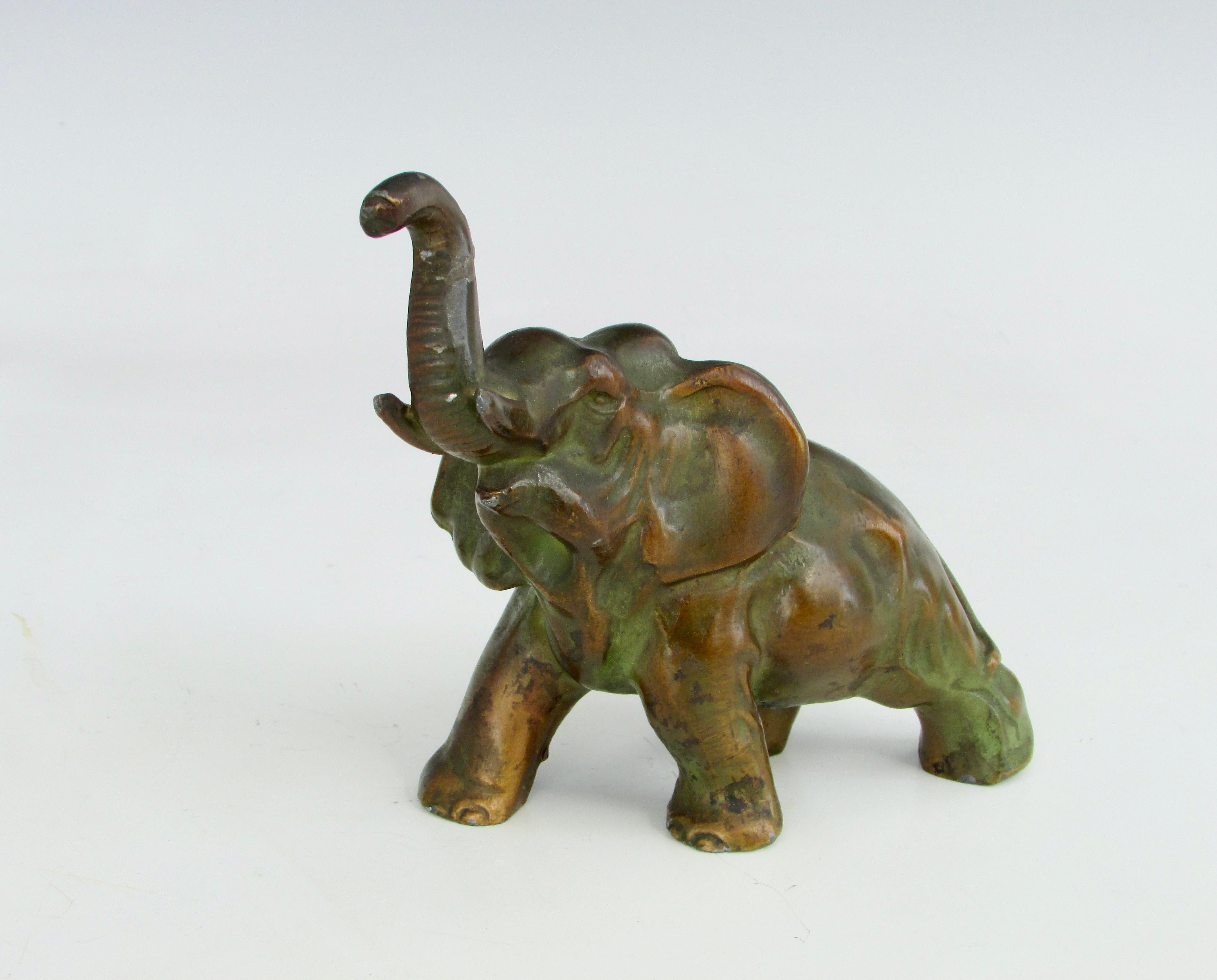 Nicely detailed diminutive elephant sculpture cast in bronze.
