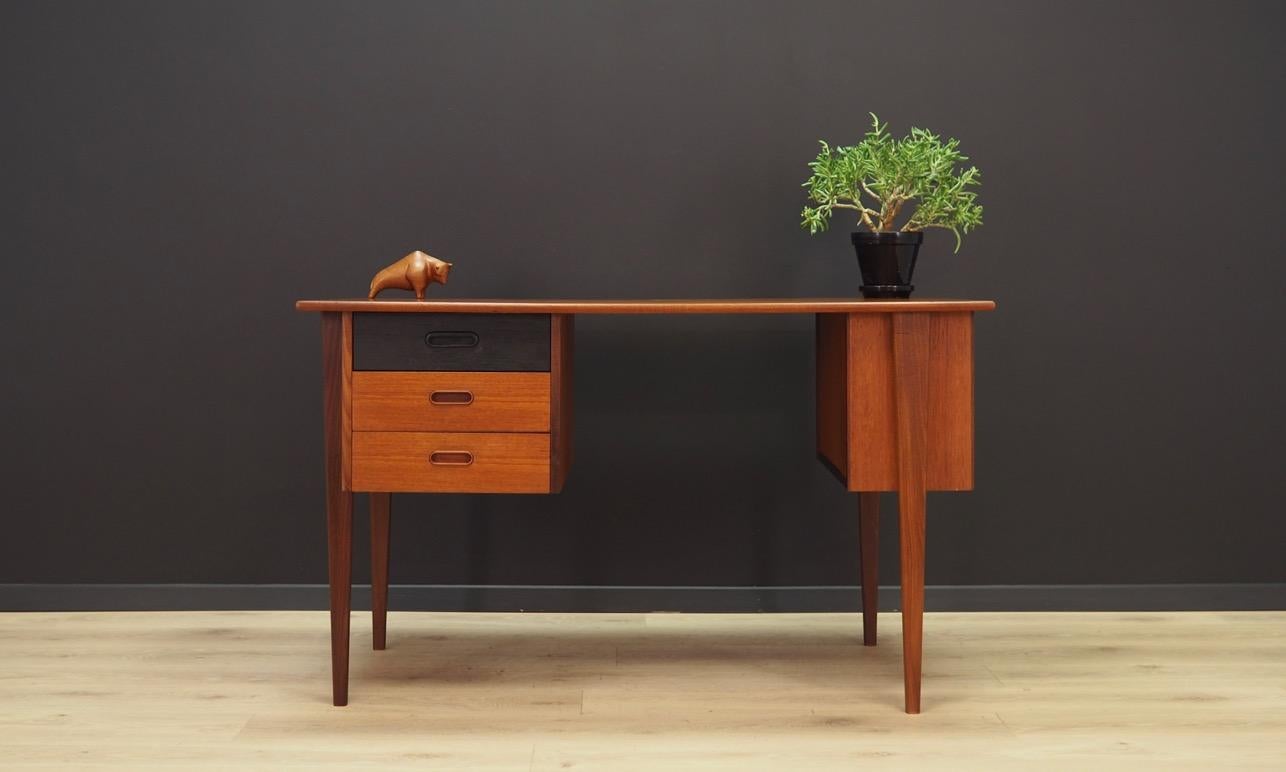 Superb desk from the 1960s-1970s. Danish design - Minimalist form. Surface of the desk finished with teak veneer, legs made of solid teak wood. Desk has three drawers. Maintained in good condition (minor bruises and scratches) - directly for