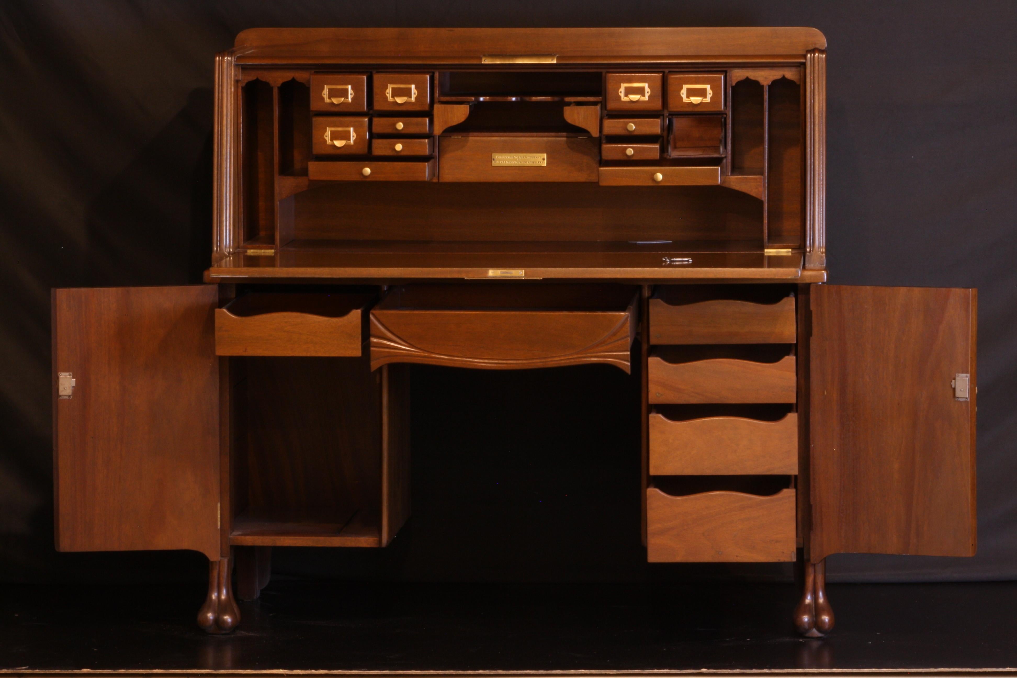 A beautiful drop front desk in walnut with interesting fitted interior. Great Art Nouveau brass fitted hardware and details. Presented to Dr. Anthony Stewart of Palmerston Ontario by appreciative friends in 1911
tags Murray -Kay Ltd which existed