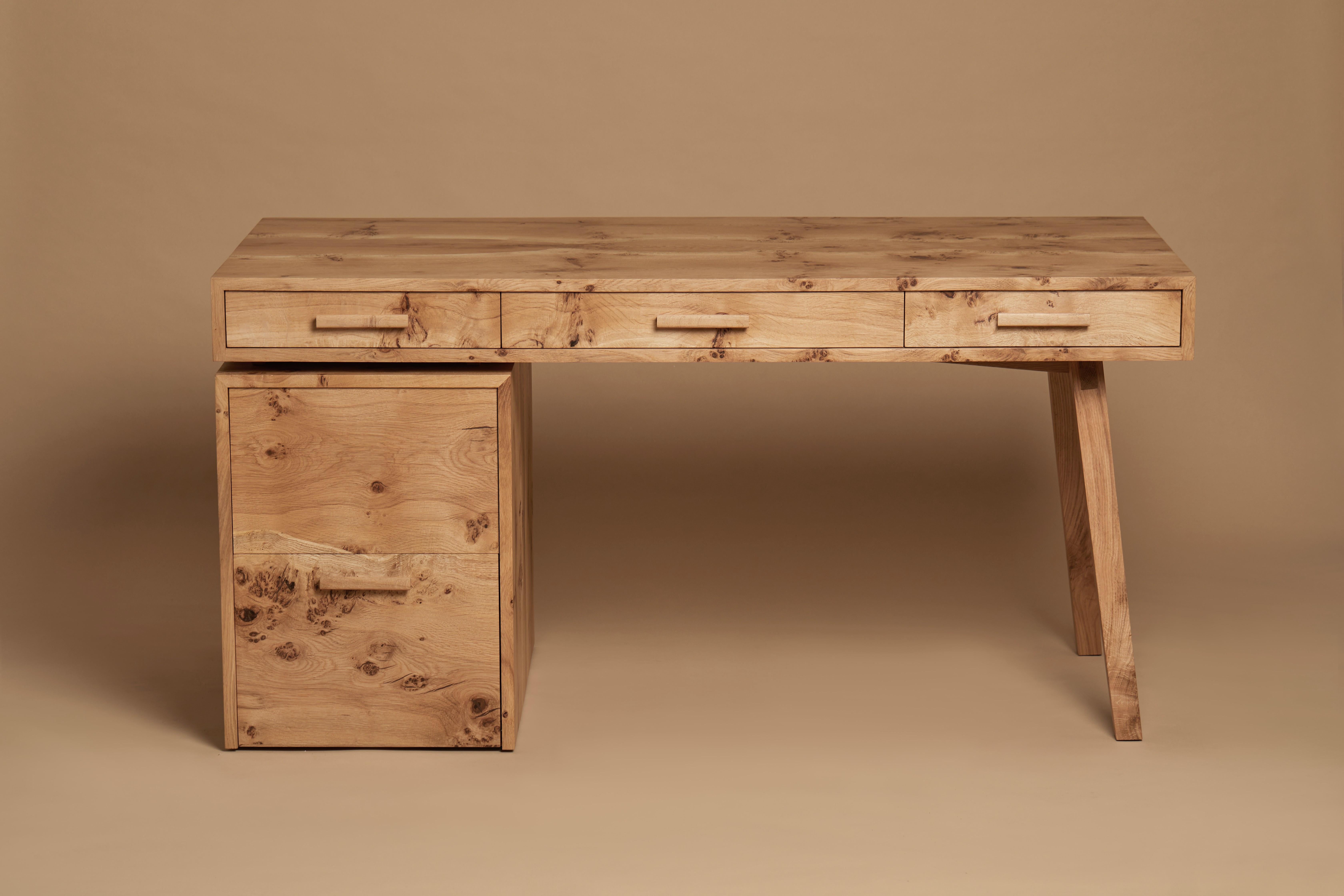 The Desk is crafted from solid English pippy oak.
The drawers run on fully extendable, concealed soft close runners.
The bottom drawer can be used for files.
On the left side of the desk, there is a fold-down and pull-out shelf for a printer. At the