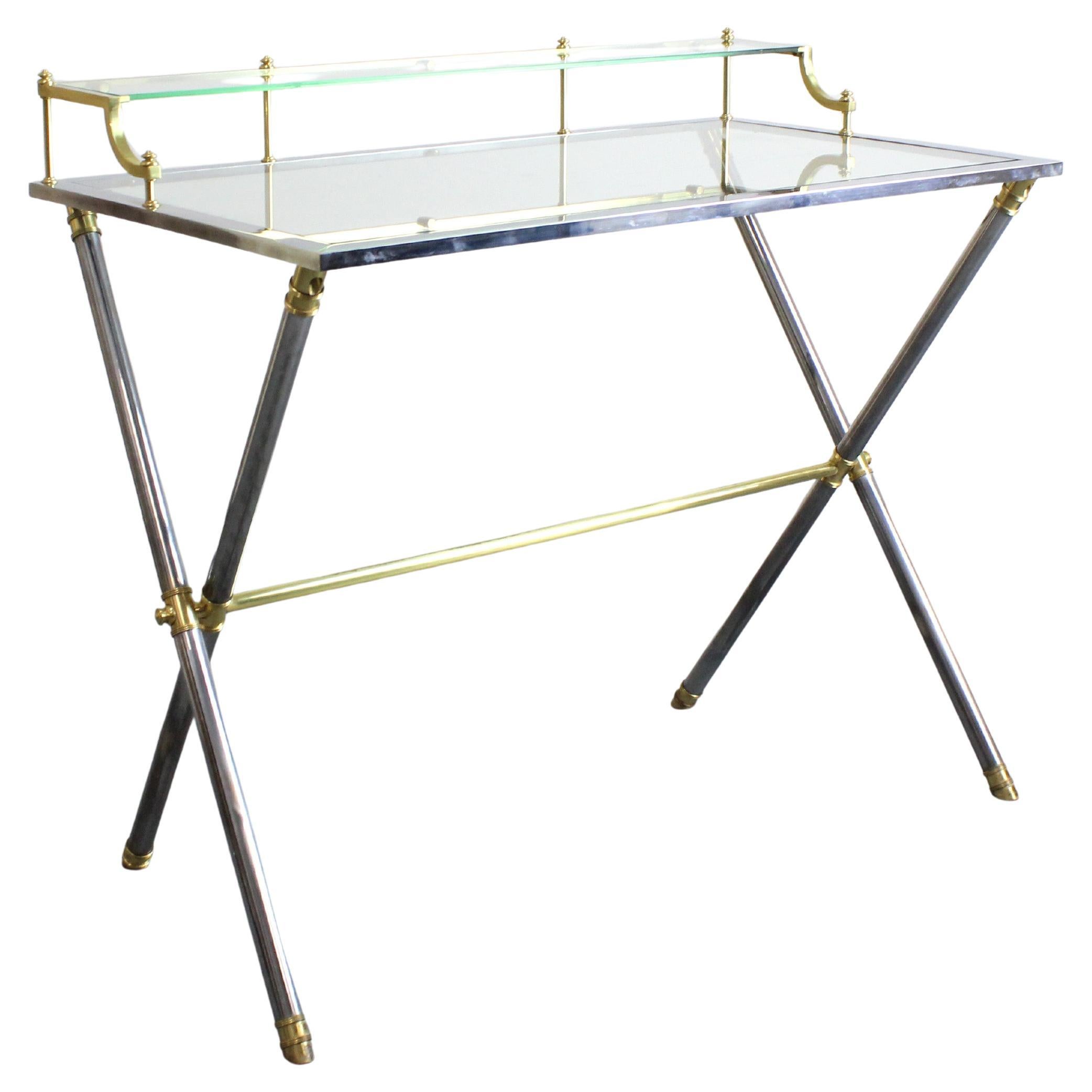 Desk with chrome-plated steel frame and gilt-plated brass details, glass top