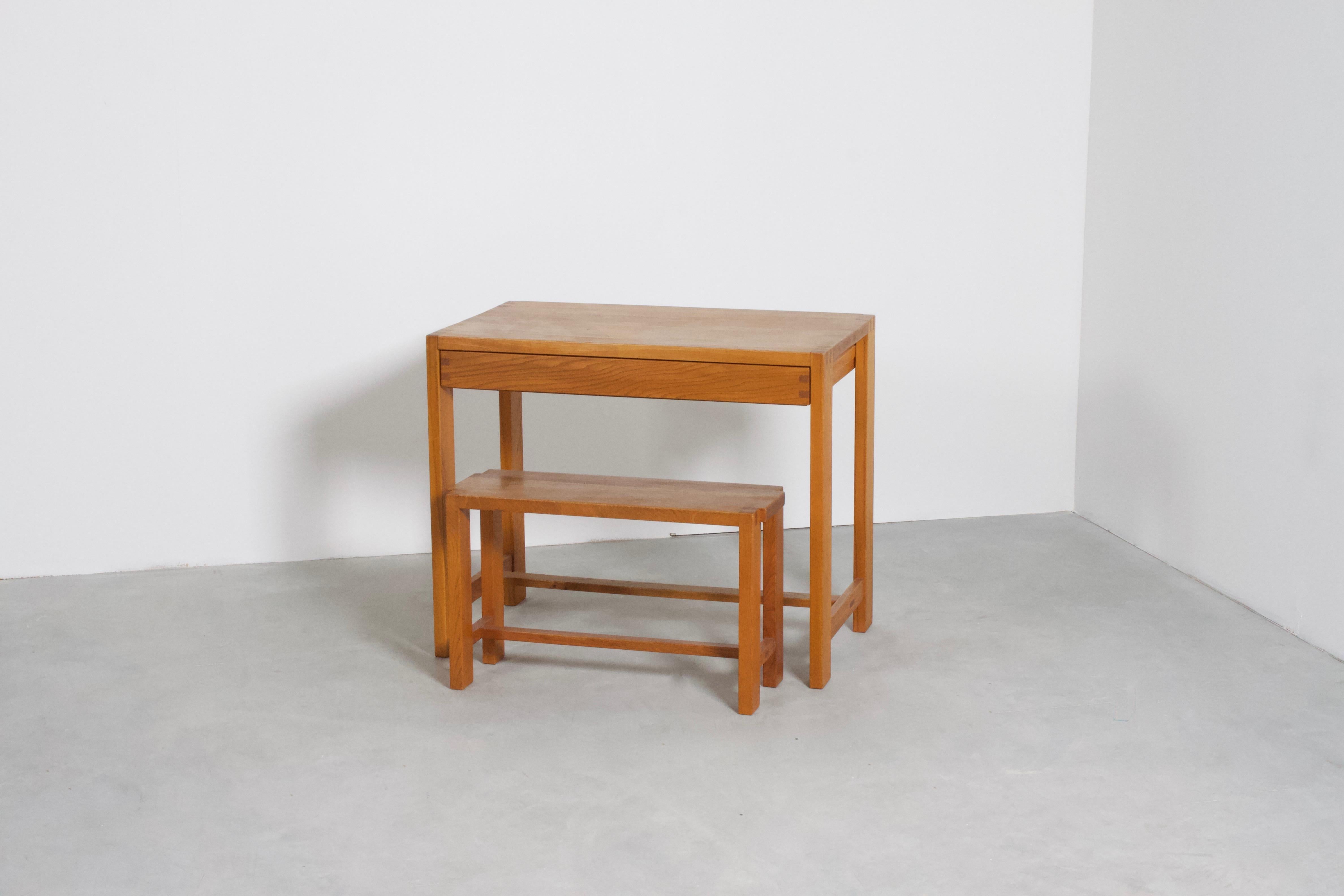 Desk B03 and matching stool S09 by Pierre Chapo in very good condition.

The desk and stool are of a minimalist design and are made of solid elm. 

The desk is equipped with a large drawer.

The joints on the corners and drawer form both essential