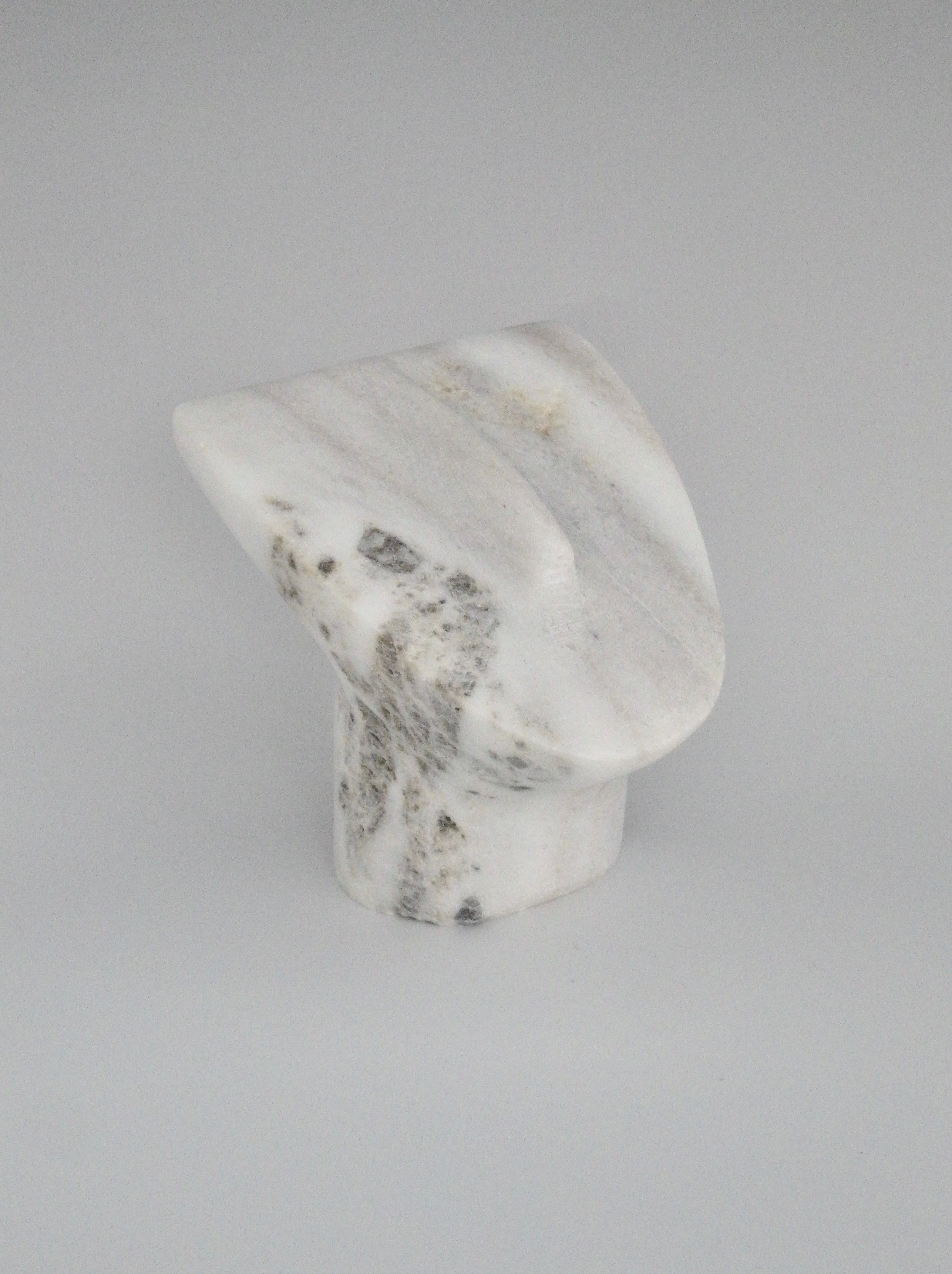 A serene, modernist white marble abstract face sculpture from a Bloomfield Hills, M estate. Veining in grays and tans. Perfect for your desktop, book shelf, or alter.