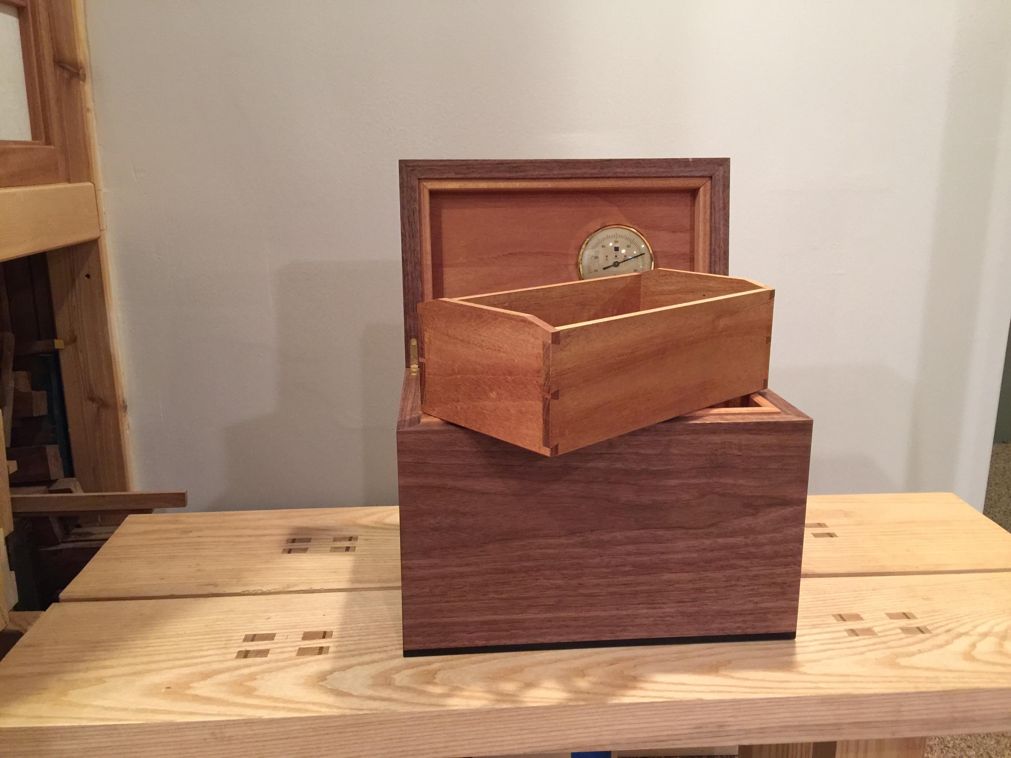 Contemporary Desktop Humidor in Curly Walnut with Details in Ebony Featuring a Leather Base For Sale