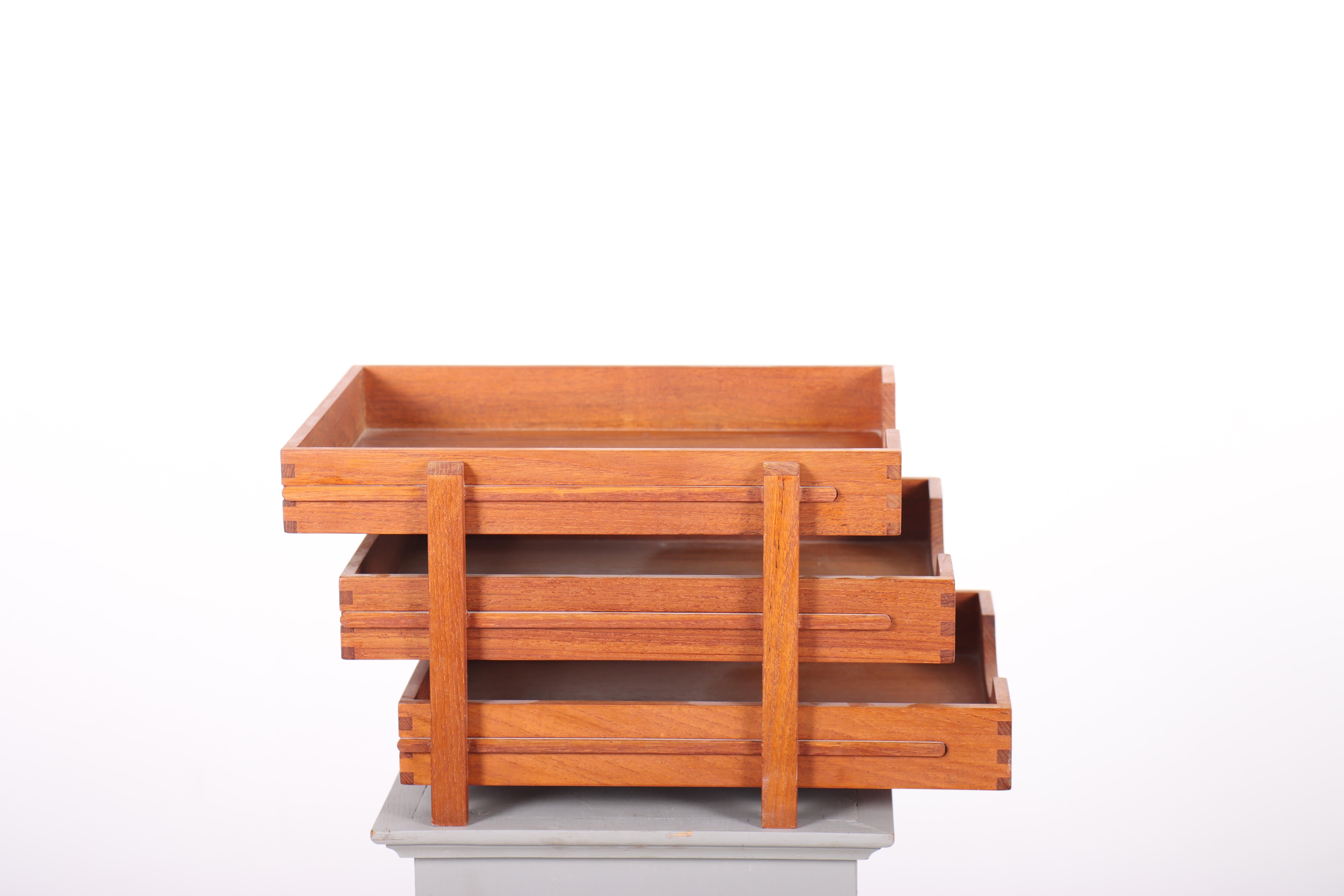 Desktop organizer in solid teak. Great quality with fine details. Made in Denmark in the 1950s.