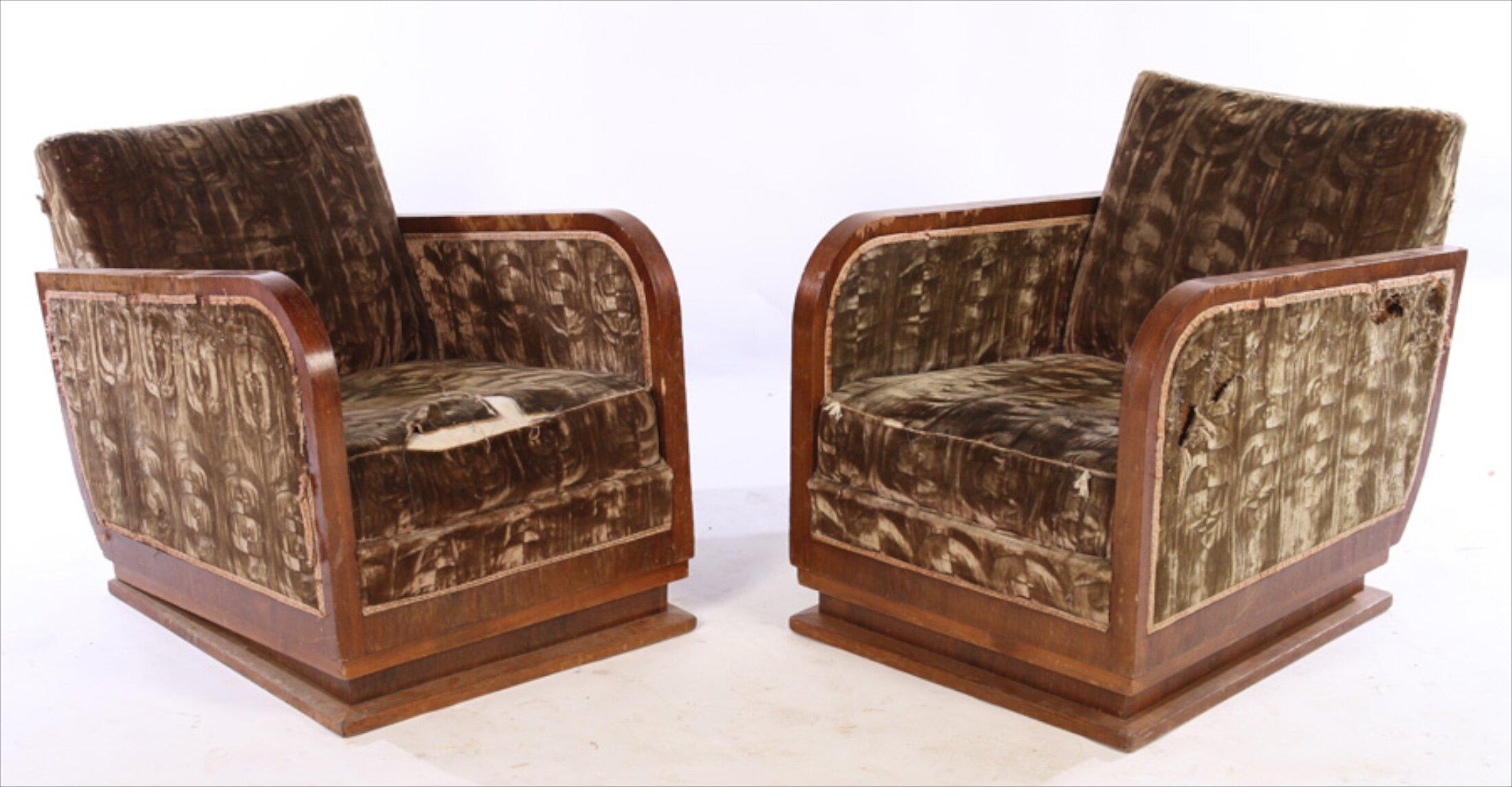 French Modernist Art Deco pair of club chairs by Desny, circa 1930. Measures: 30” wide x 32” deep x 33” high. 

Unrestored in the photographs.

Desny was active 1927-33 on avenue des Champs-Elysees in Paris. The principals of the firm were the