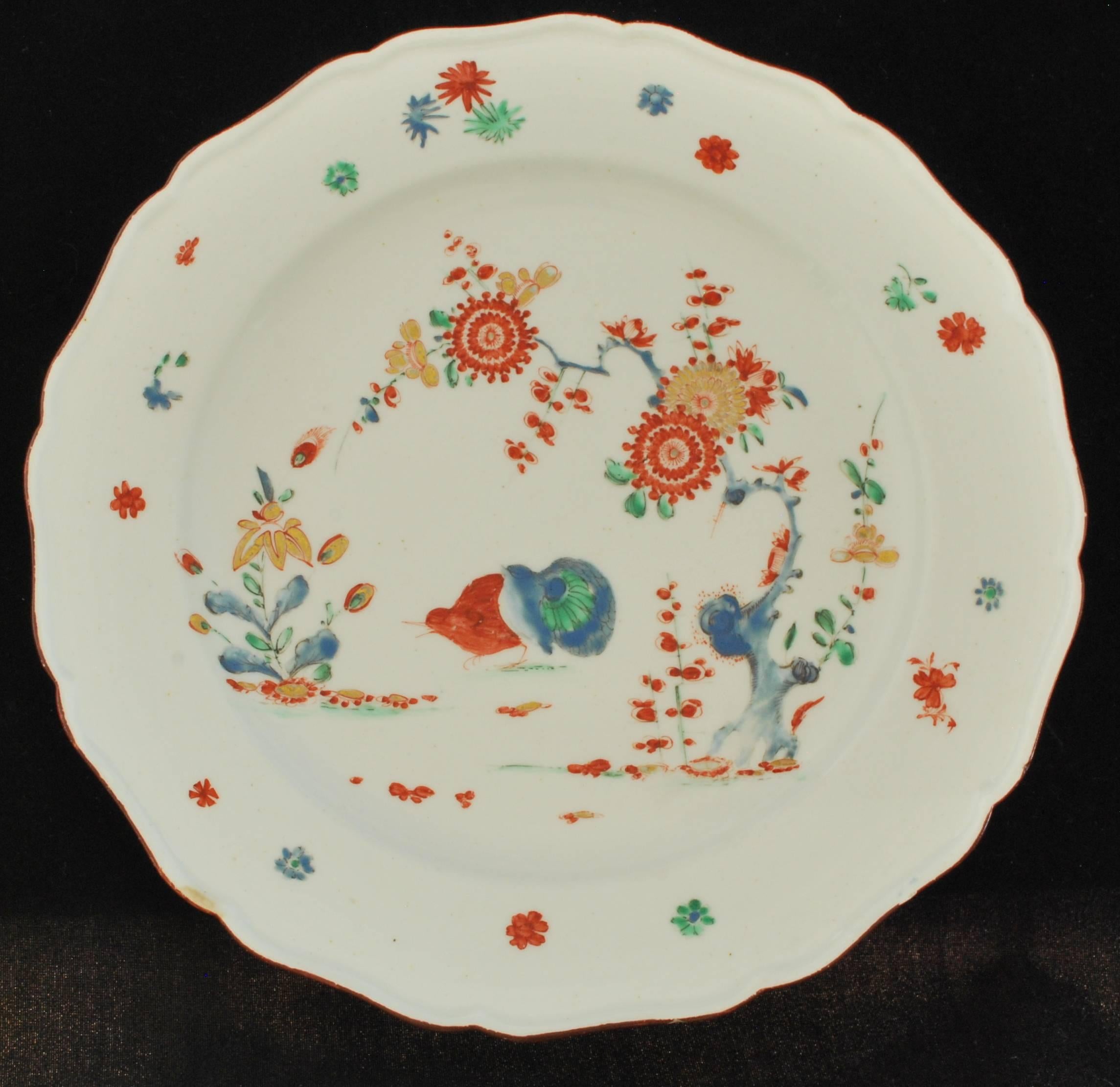 A superb dessert plate of Meissen form with raised and lobed rim surrounding an inner flange above a shallow well; the rim edged in chocolate brown. The well of the plate painted with a version of the traditional Kakiemon ‘Partridge (Two Quail)