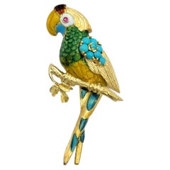 Broche 3D detallado de loro en oro amarillo de 18 quilates con piedras de rubí y turquesa