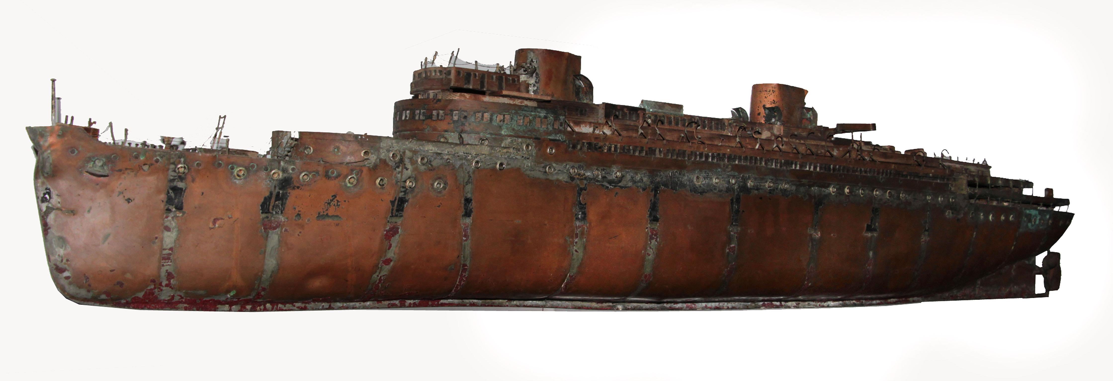 This is a beautiful unique one-of-a-kind copper ship, hand crafted from carved wood, copper and a brass propeller. The details are incredible, from the wire railing to the carved wood doorways and windows. Folded copper staircases and a working