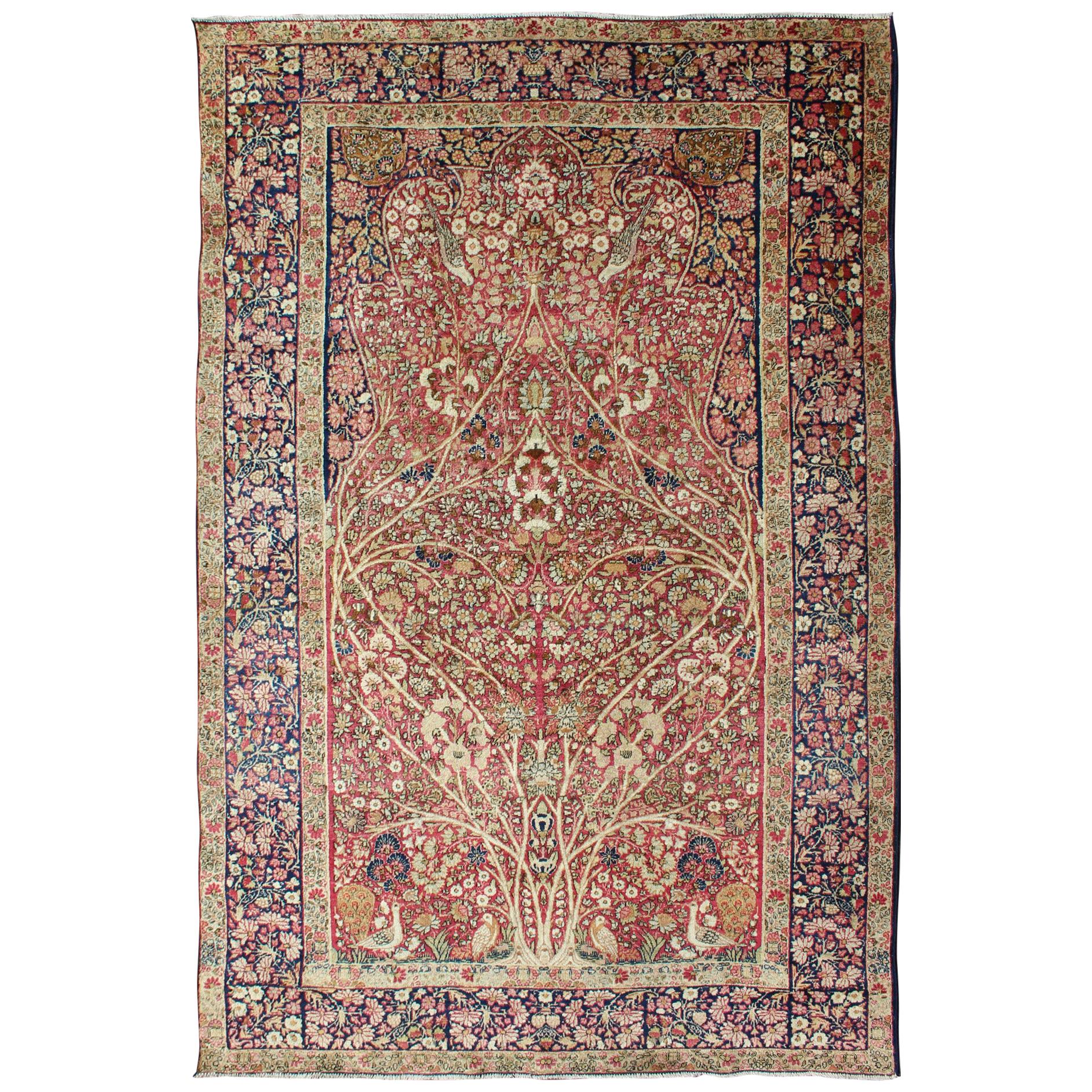 Très beau tapis persan ancien Lavar Kerman à motifs floraux complexes 