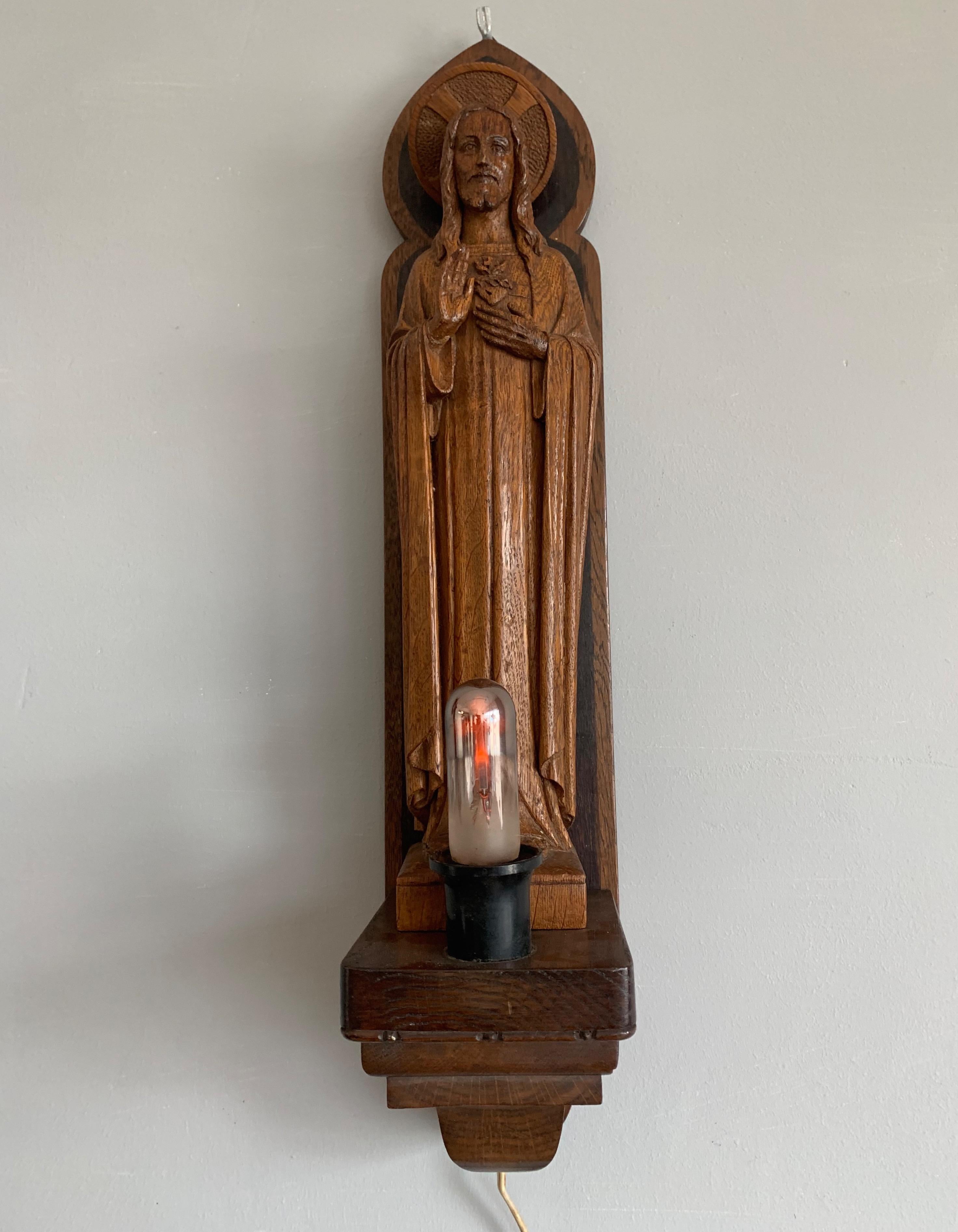Detailed Hand Carved Oak Sacred Heart of Jesus Statue on Wall Console with Light In Excellent Condition In Lisse, NL