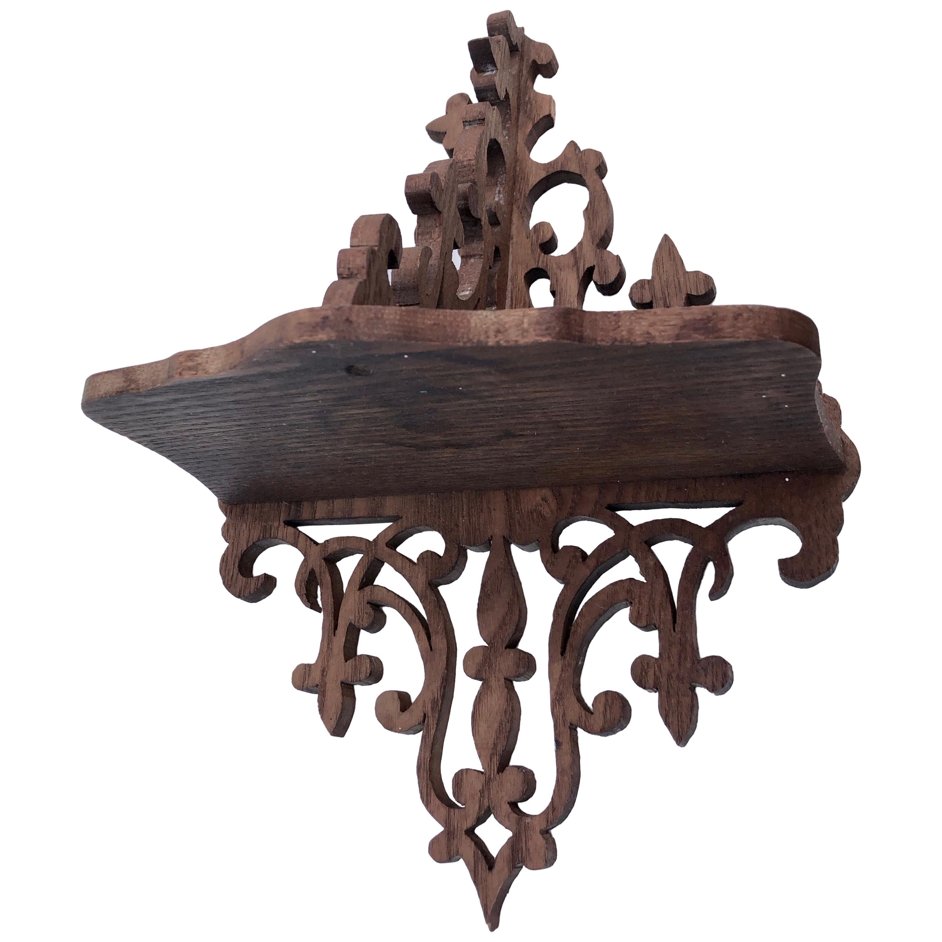 Detailed Hand Carved Wood Wall Sconce with One Shelf For Sale