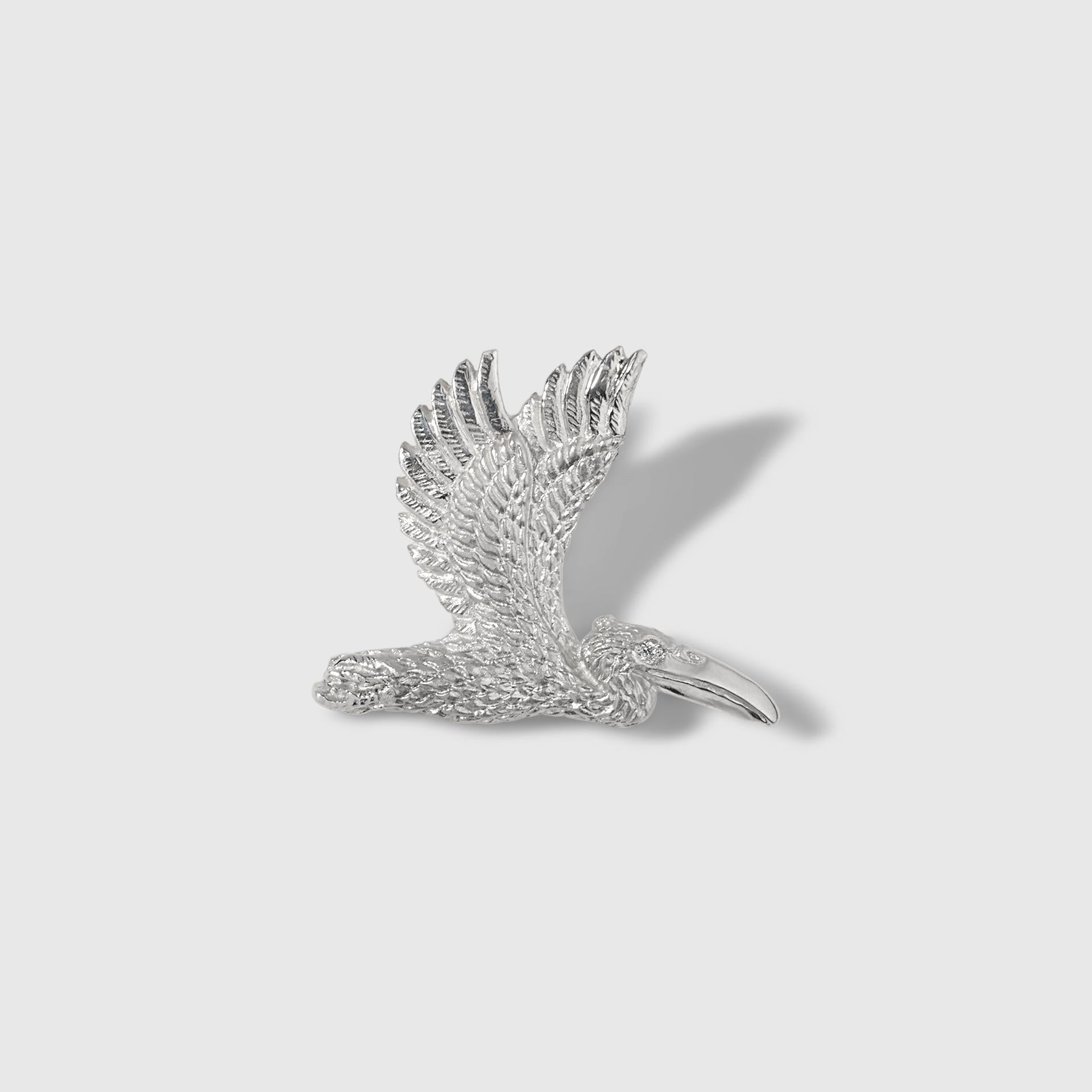 Detailed Sterling Silver Pelican Brooch Pin with Diamond Eye by Ashley Childs

Pelican originally carved by 