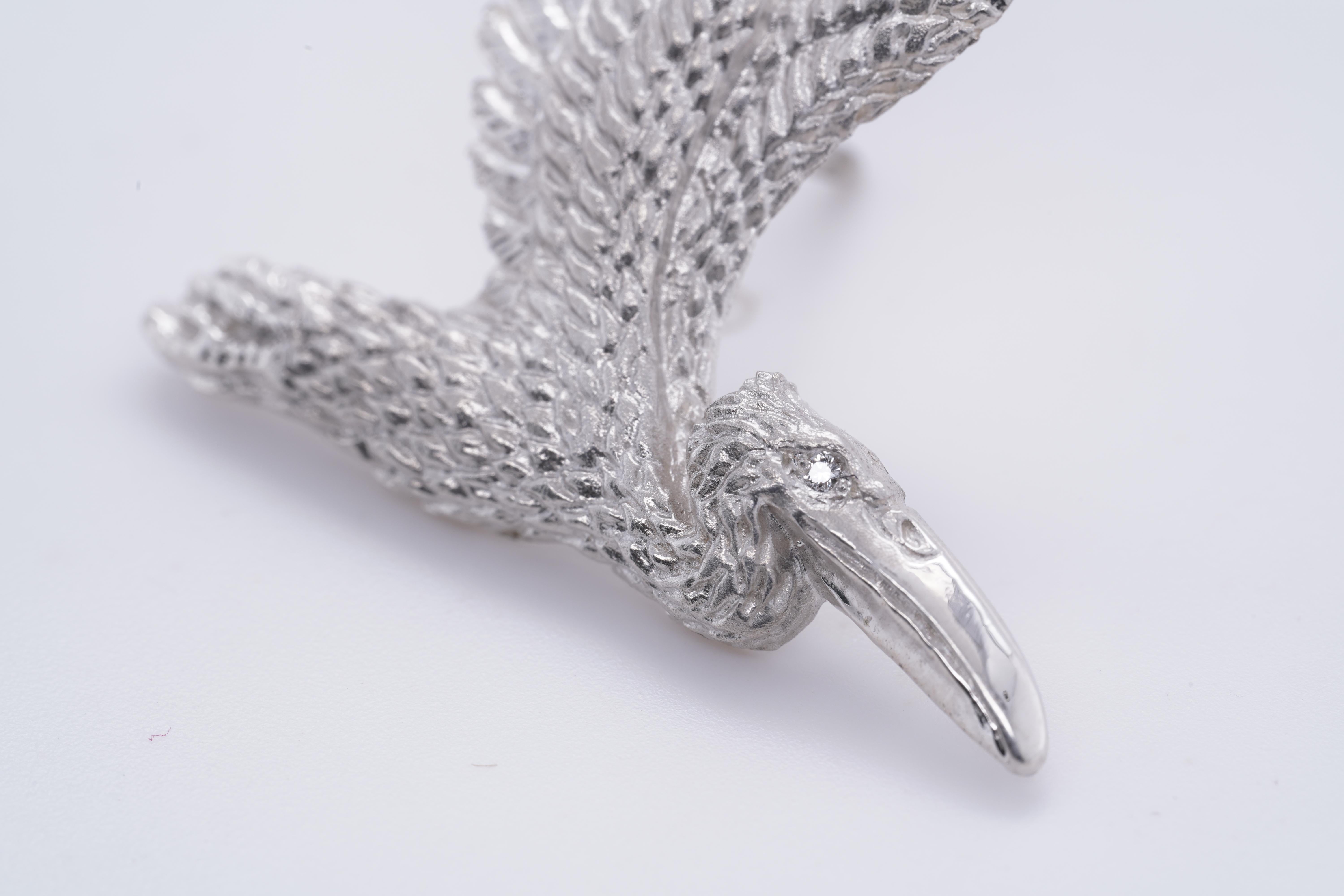 Contemporary Detailed Sterling Silver Pelican Brooch Pin with Diamond Eye by Ashley Childs For Sale