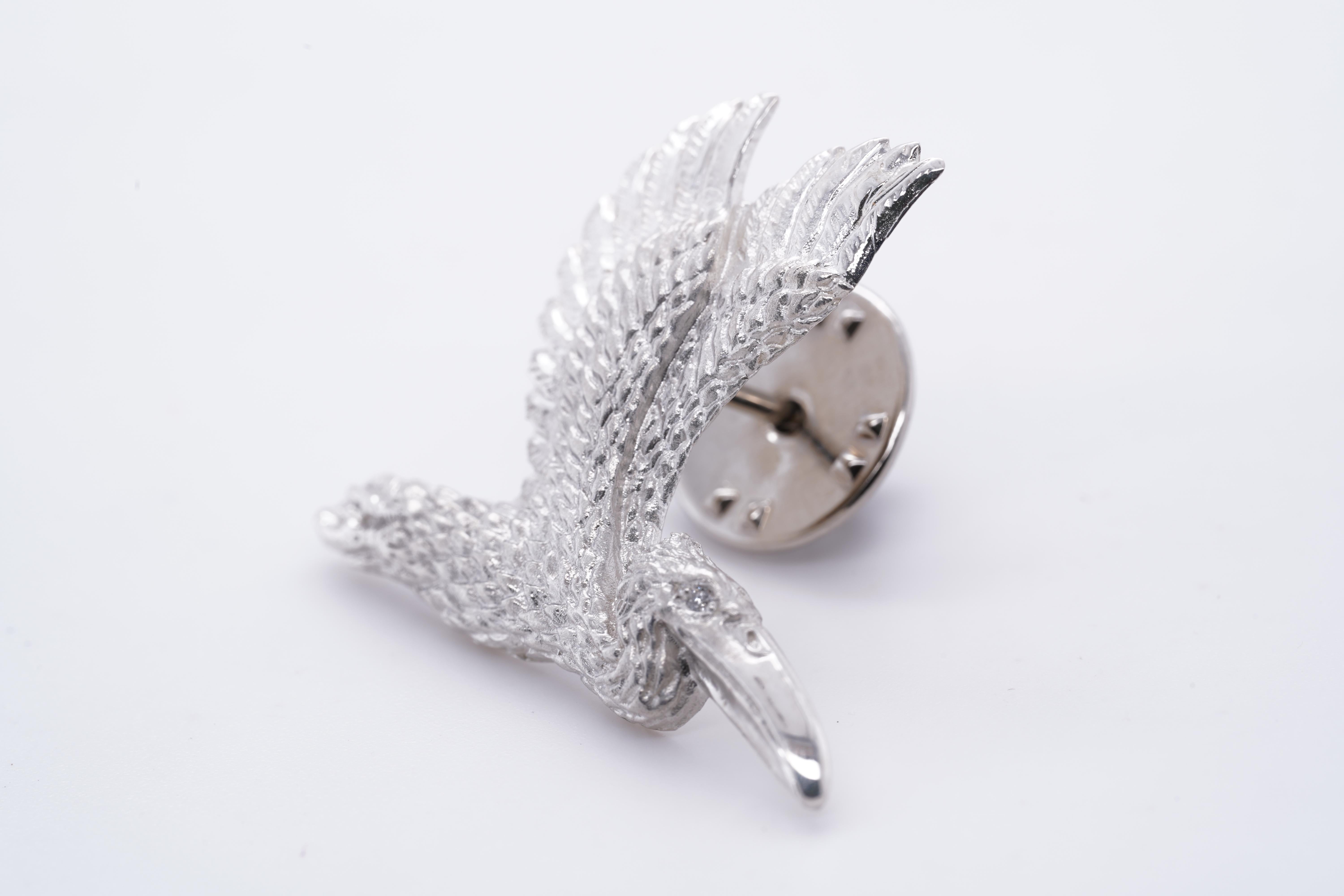 Round Cut Detailed Sterling Silver Pelican Brooch Pin with Diamond Eye by Ashley Childs For Sale