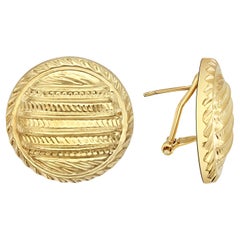 Boucles d'oreilles rondes matelassées verticales détaillées