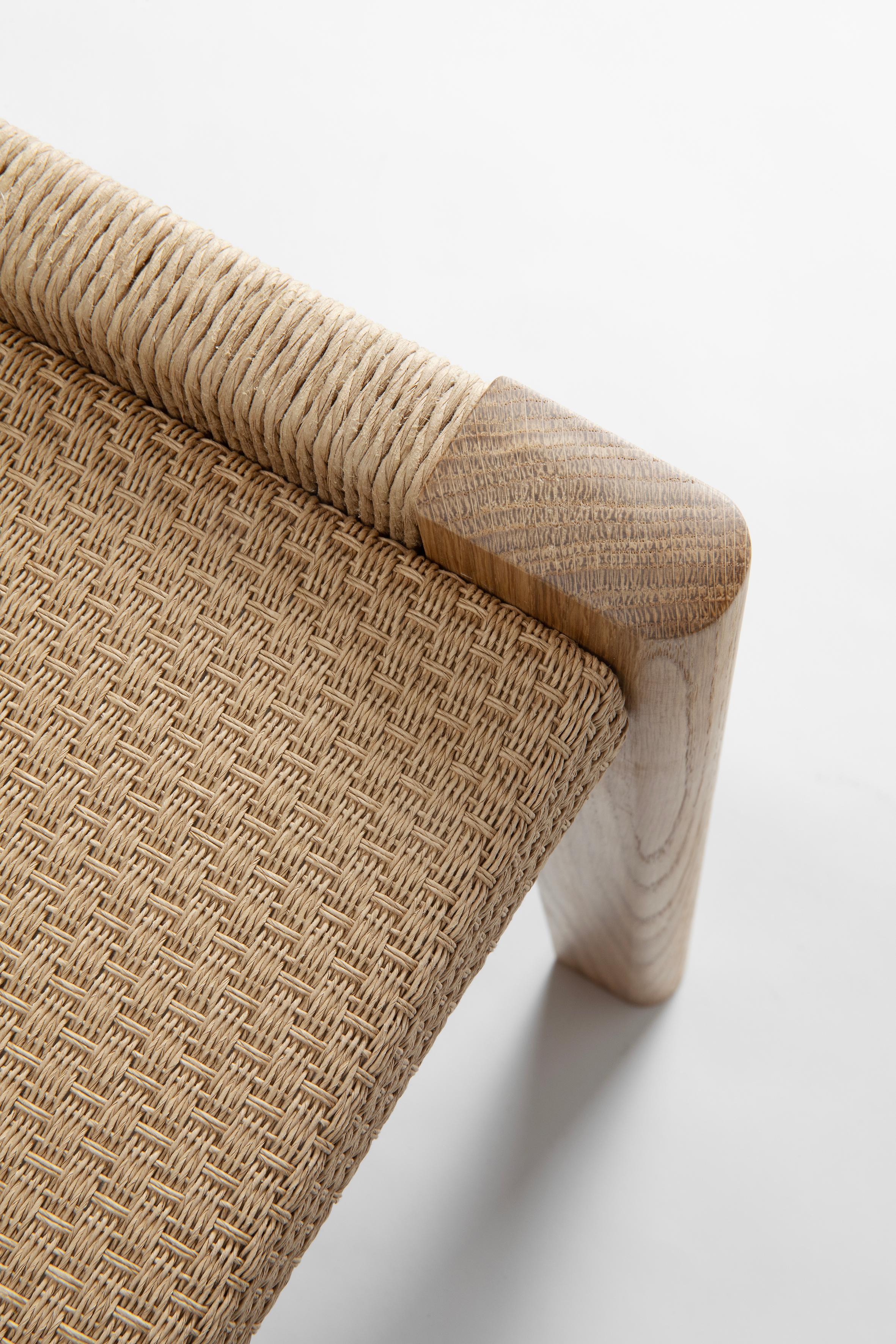 Detalji (“detail” in Finnish) bench (designed 2021) is made following the traditional Nikari craftsmanship solutions, accompanied with delicate Woodnotes paper yarn fabric “Woodpecker”, designed by Ritva Puotila. Paper yarn is also used separately