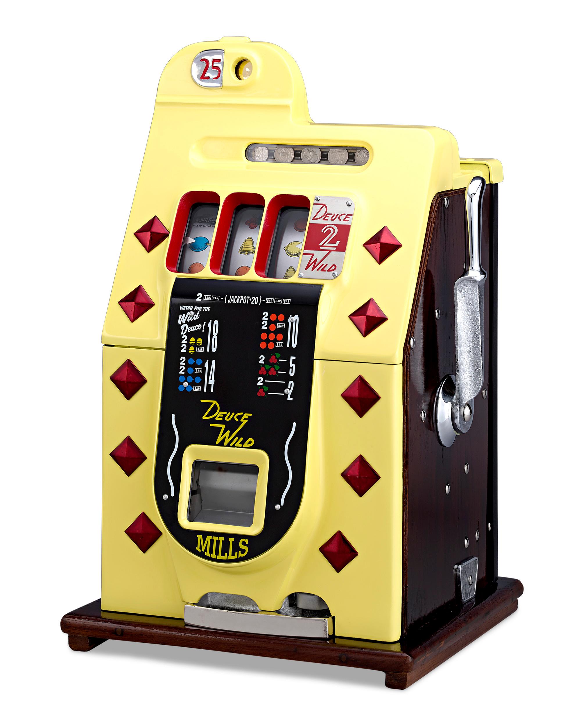 Created by the Mills Novelty Company of Chicago, this rare 25-cent deuces wild diamond front slot machine is a nostalgic piece of Americana. Visually enticing with its brilliant yellow and red color palette, this slot machine is crafted of cast iron