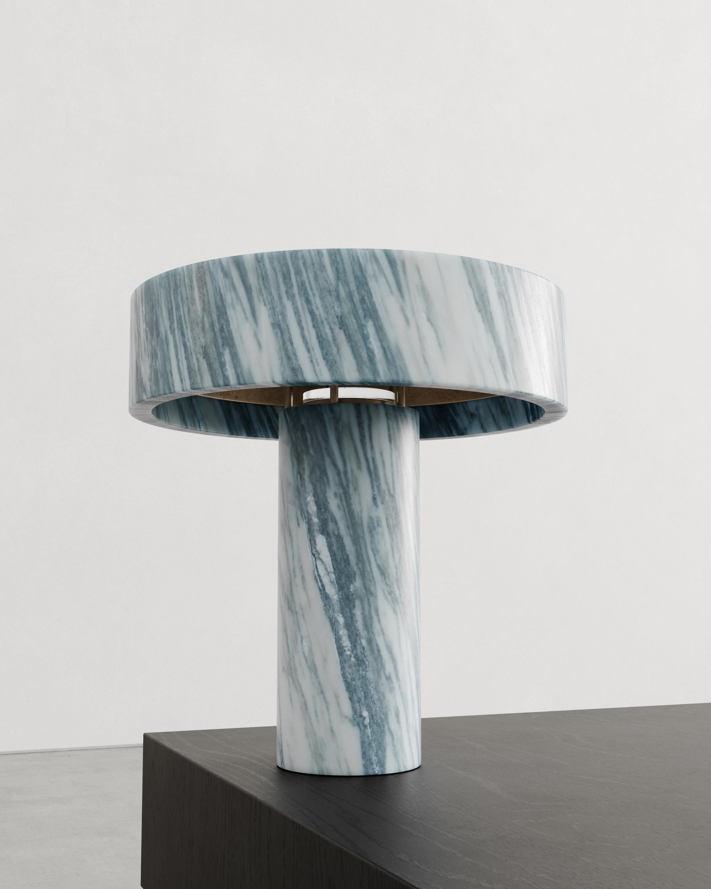 Deus Table Lamp by Studio Romell
Dimensions: D 39 x H 41 cm
Materials: Marble Cipollino Green, Murano Glass, Cast Bronze.

Carlos and David, hailing from Sweden, have both cultivated a profound affinity for various forms of art. Currently living in