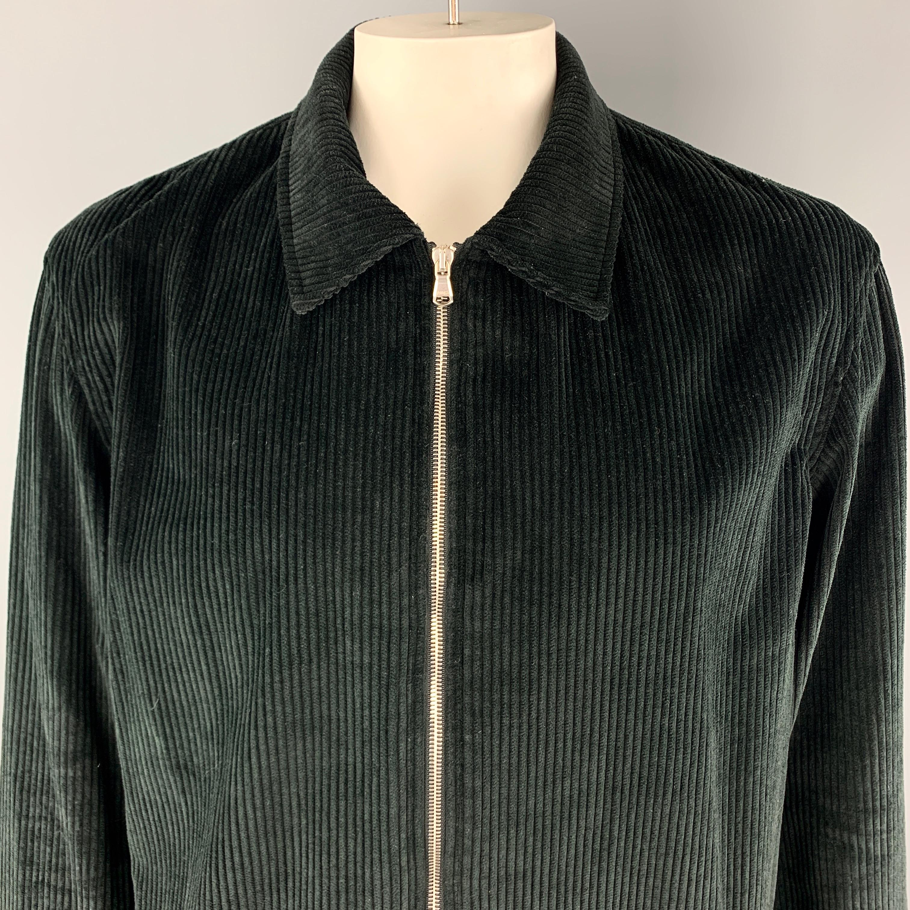 DEVEAUX New York Jacket comes in a solid black corduroy material, with a zip closure, single breasted, belted cuffs, unlined. Made in USA.

Excellent Pre-Owned Condition.
Marked: US 3

Measurements:

Shoulder: 20.5 in. 
Chest: 52 in. 
Sleeve: 26.5