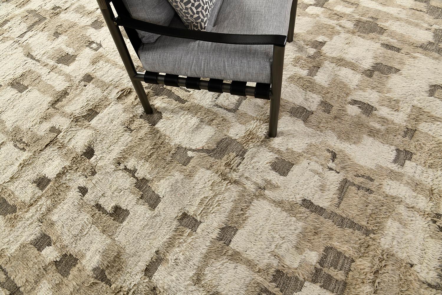 The Deverpa rug is a handwoven wool piece inspired by vintage Scandinavian design elements and recreated for the modern design world. The rug's shag balance and harmony, handwoven with a neutral flat weave and extraordinary piles of camouflage. This