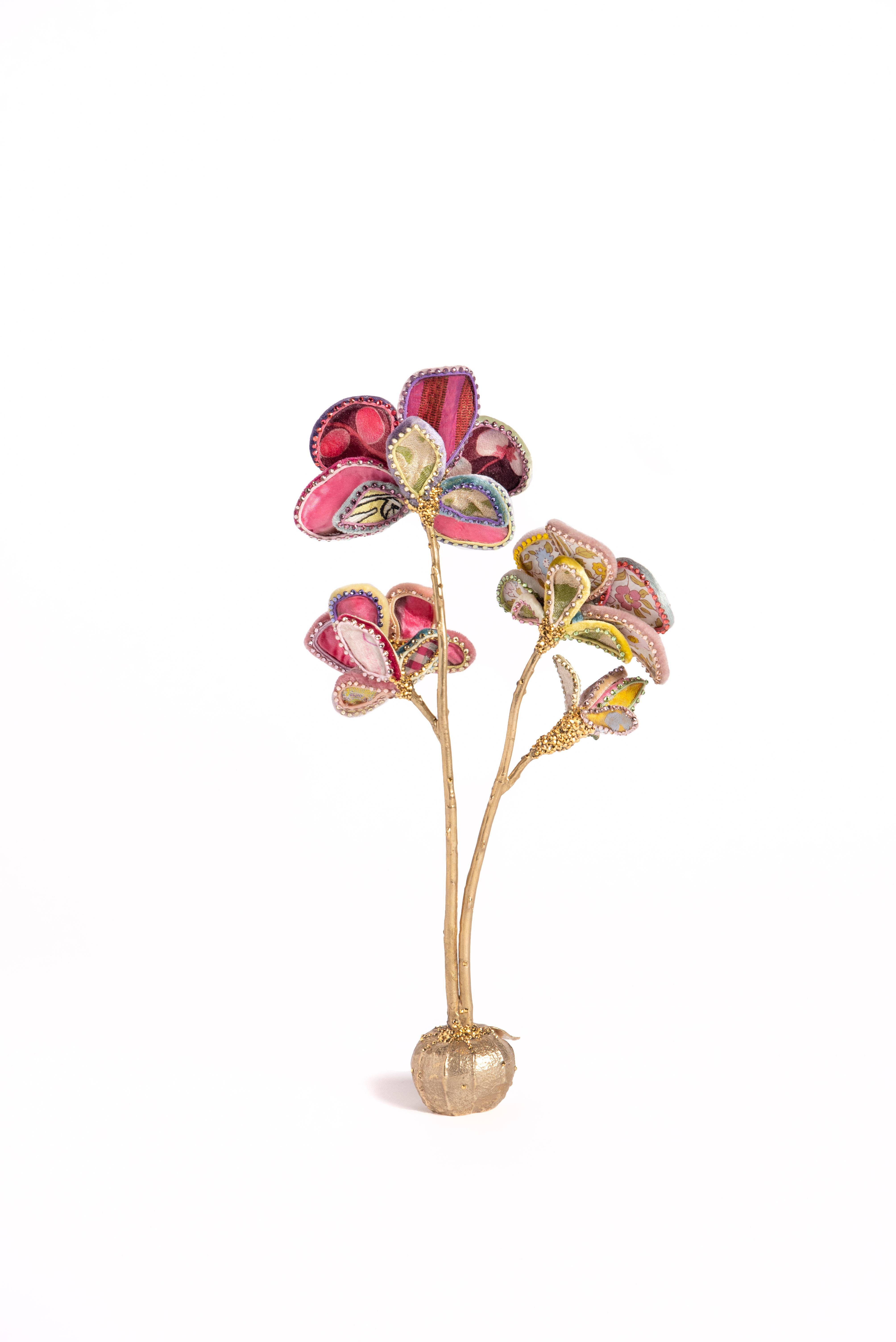 Pale Pink & White-toned Orchid in silk and velvet resting upon a bulb-shaped brass base. Adorned with vintage millinery embellishments, European crystals, and vintage faux-stamen. Designed and handmade in NYC. Comes in both stoned & un-stoned