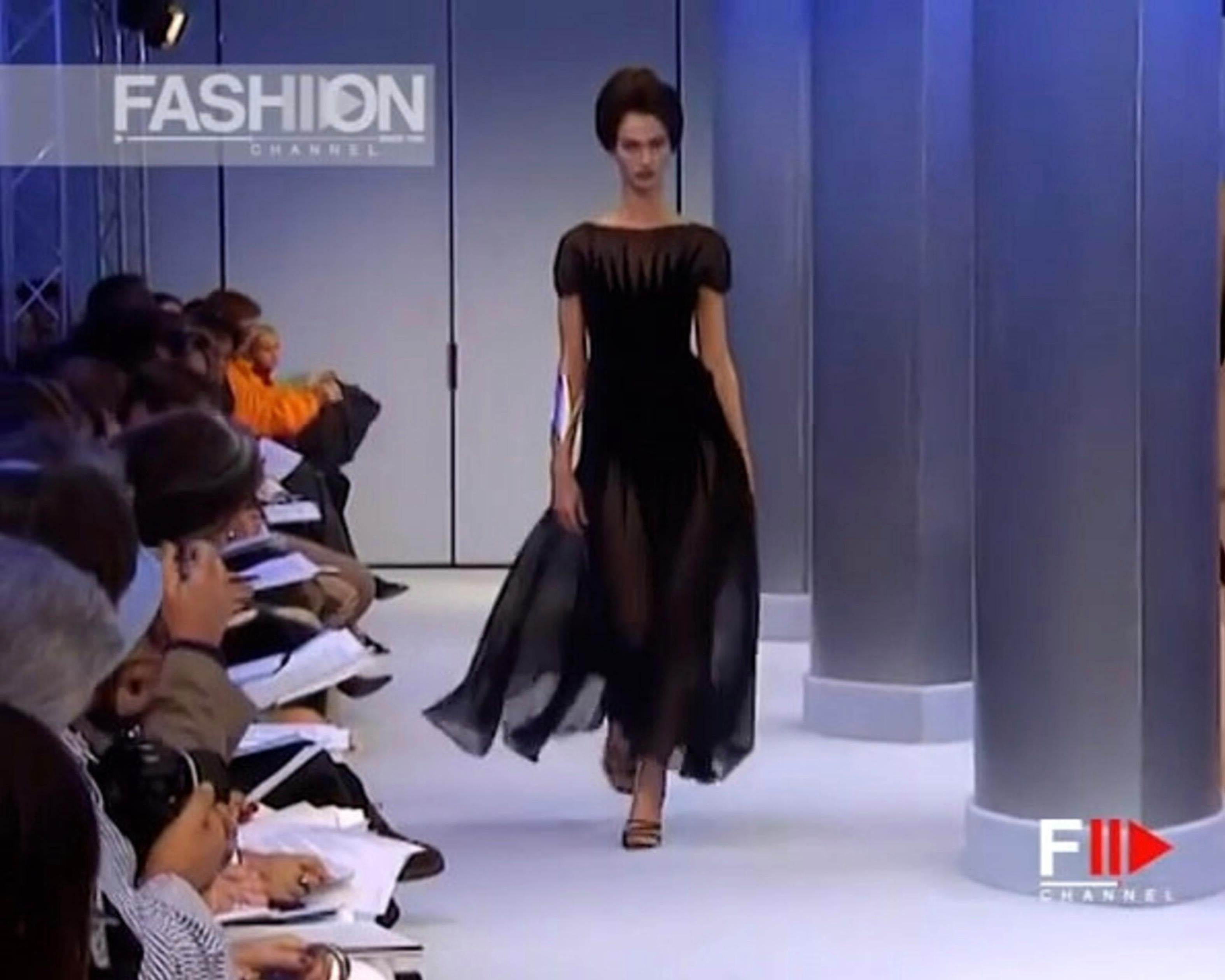 
Thierry Mugler Spring Summer 2000 Collection. This Runway documented piece is so devine.
Long semi sheer evening gown with the most amazing movement when walking. So elegant and sexy - black evening dress with the most delicate semi sheer