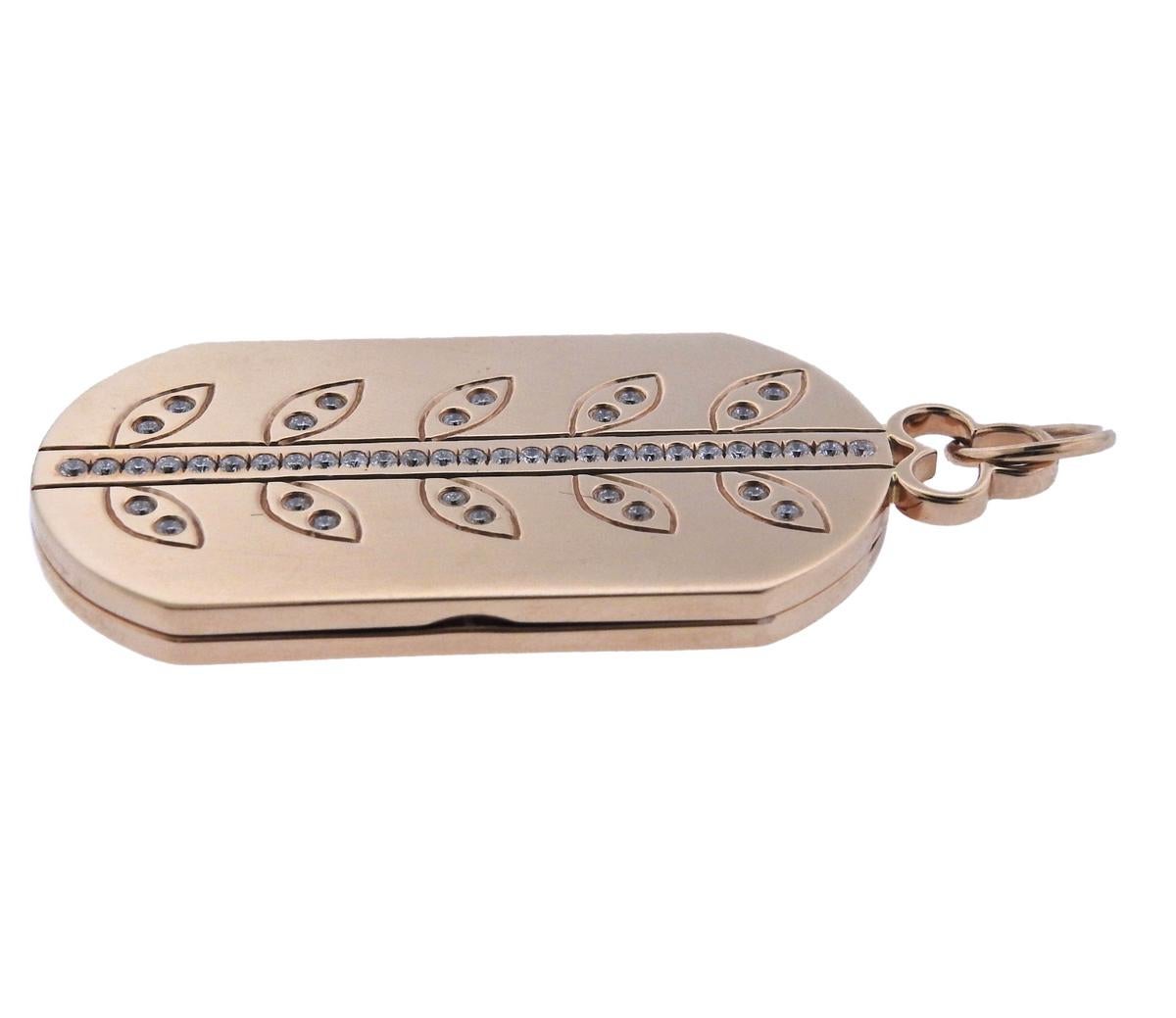 18k yellow gold Vine dog tag pendant, adorned with approx. 0.47ctw in diamonds. Retail $7200.   Pendant is 52mm long with bale x 22mm, weighs 19.3 grams. Marked: 750.