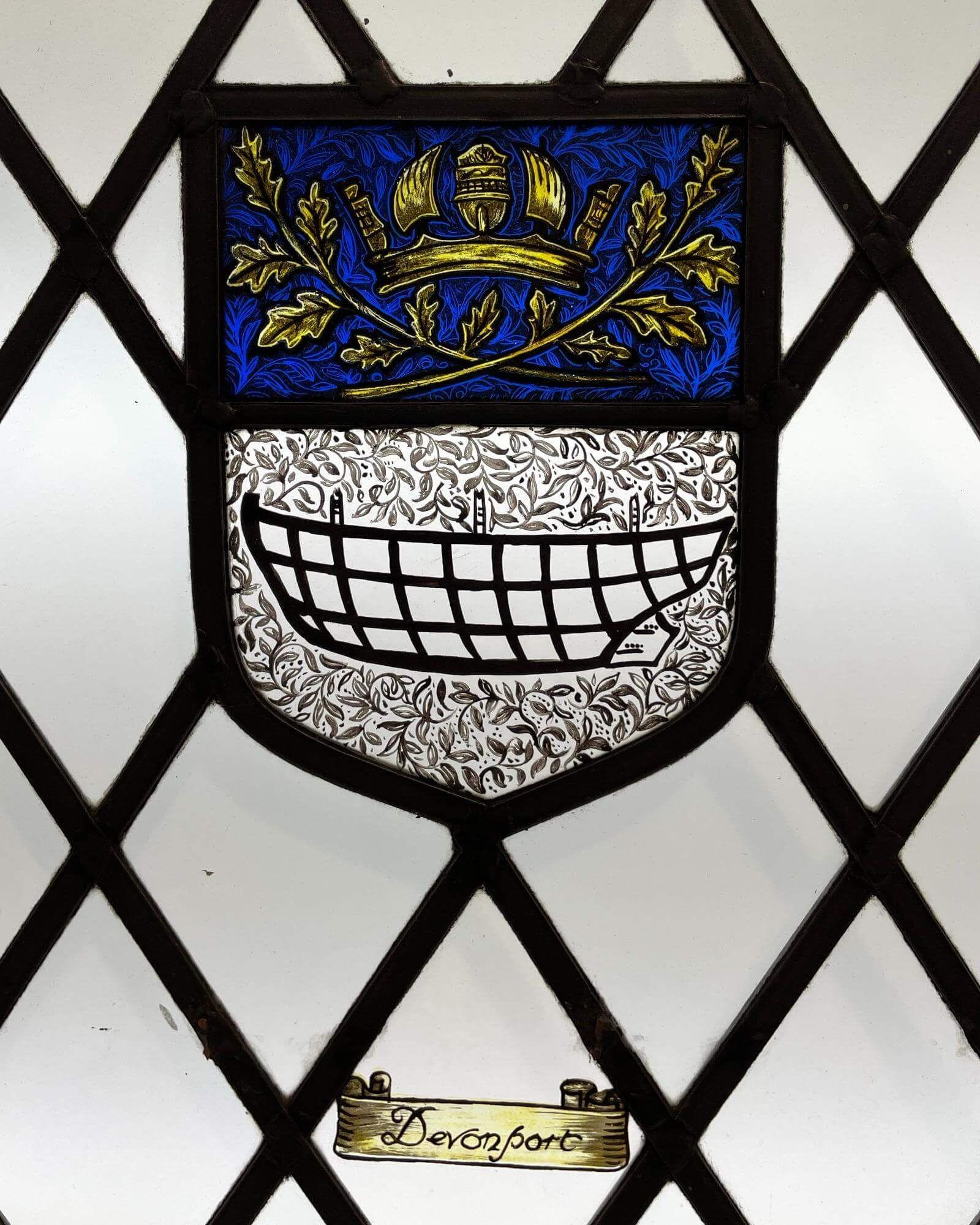 An early 20th century antique English stained glass window detailed with the Devonport Coat of Arms. This stained glass window is one of a series of panels we are selling from towns and cities on the south coast of the British Isles.

The Devonport