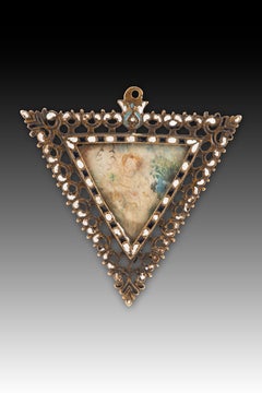 Devotional medallion. Bronze, enamel, etc. Spanish school, 17th century.