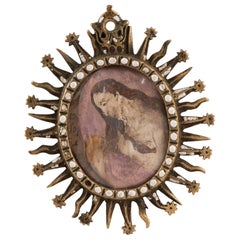 Devotional medallion. Bronze, enamel, etc. Spanish school, 17th century.