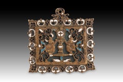 Devotional medallion. Bronze, enamel, glass, etc. Spanish school, 17th century.