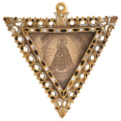 Devotional medallion. Bronze, enamel, glass, etc. Spanish school, 17th century.