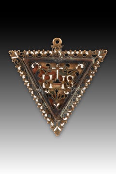 Devotional pendant, Saint Teresa of Ávila. Bronze, enamel, etc. Spanish School.