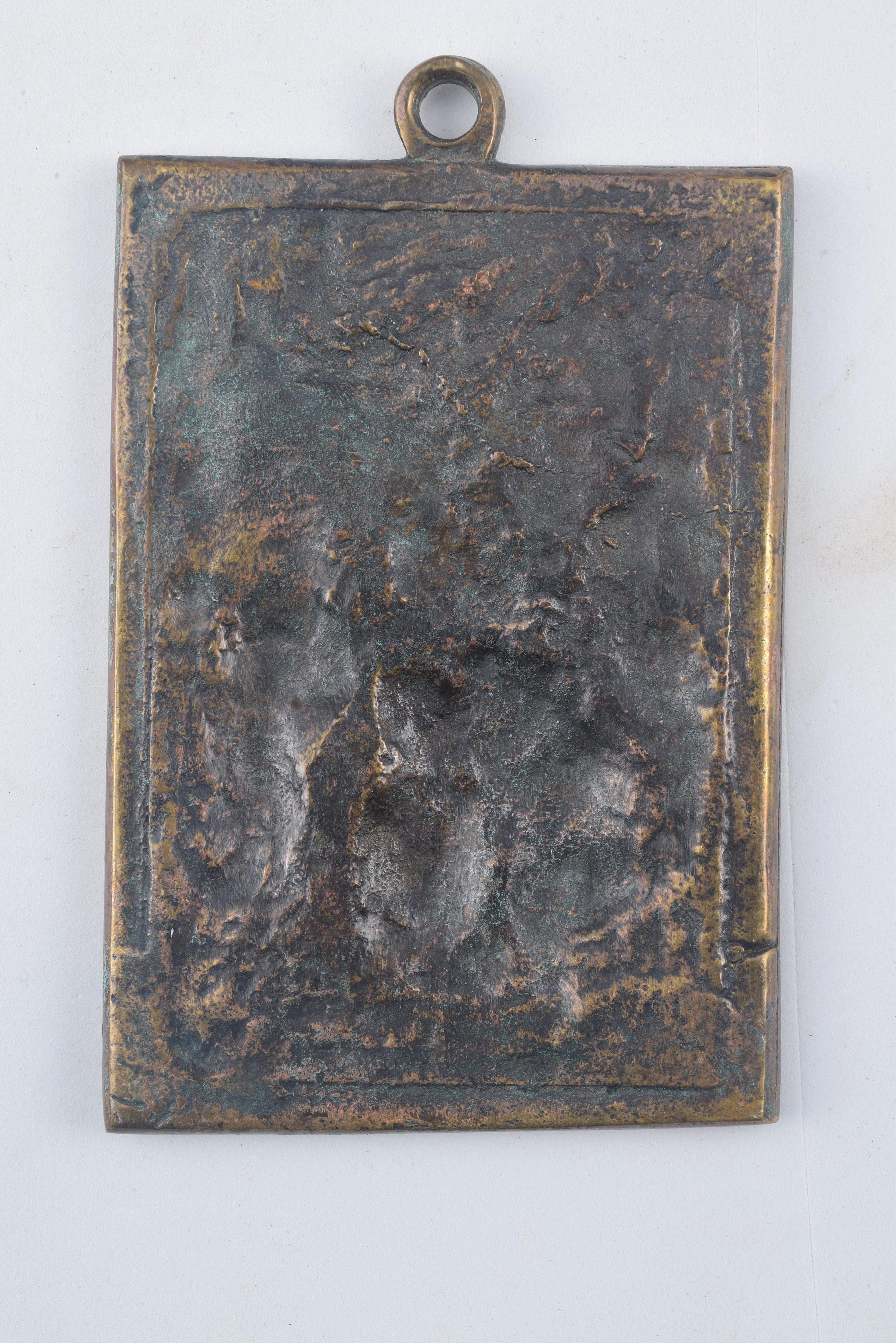 Devotional plaque, Adoration of the Three Wise Men. Bronze. Spanish school, 17th century.
 Rectangular devotional plaque made of bronze, which presents the scene of the Birth of Jesus in relief. The Virgin Mary has the Child standing on her knees in