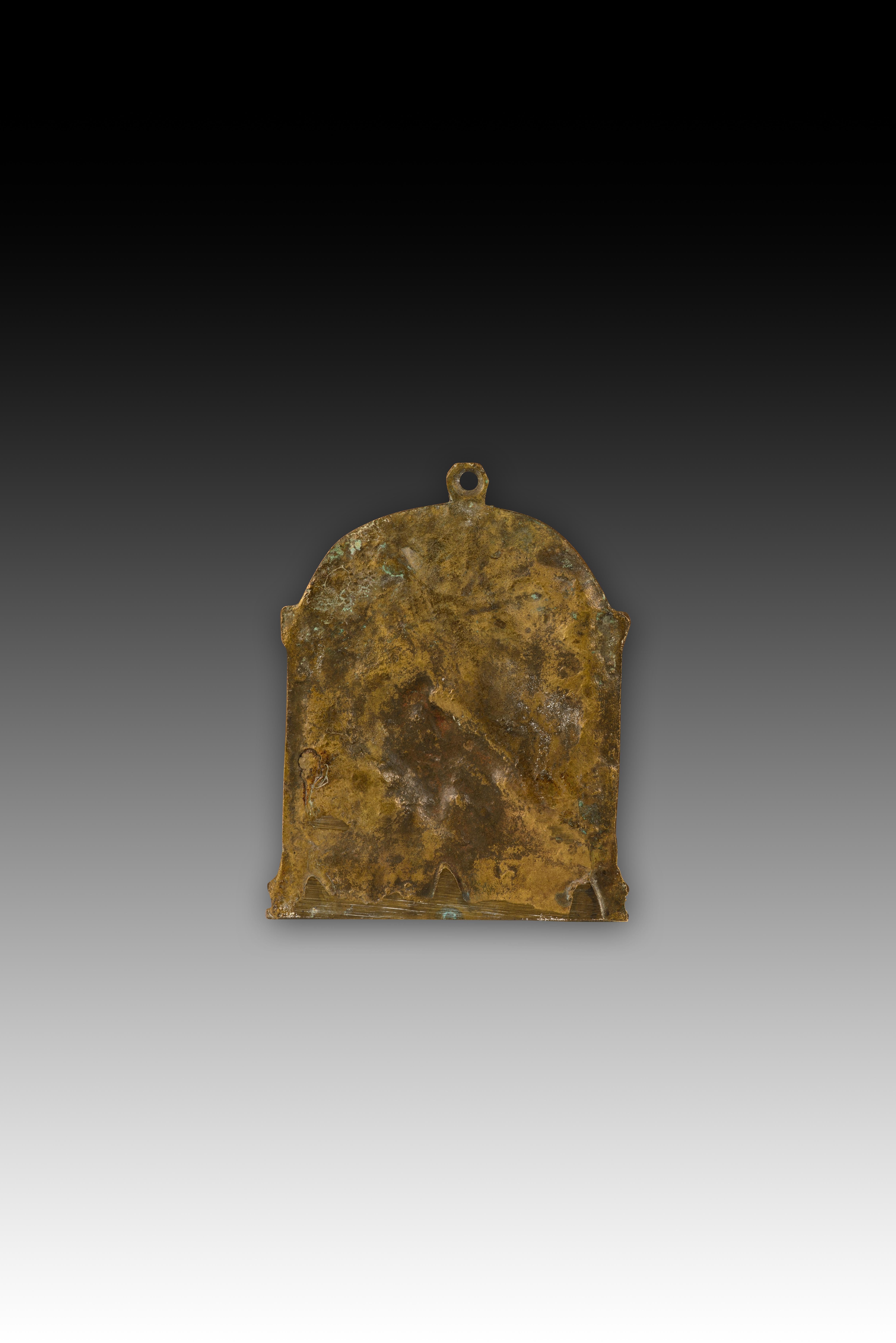 Devotional plaque, The Prayer in the Garden. Bronze. 19th century. 
Devotional plaque featuring a ring at the top for wall mounting and a religious figurative relief on the front framed by an arch, two columns, and a band of architectural elements