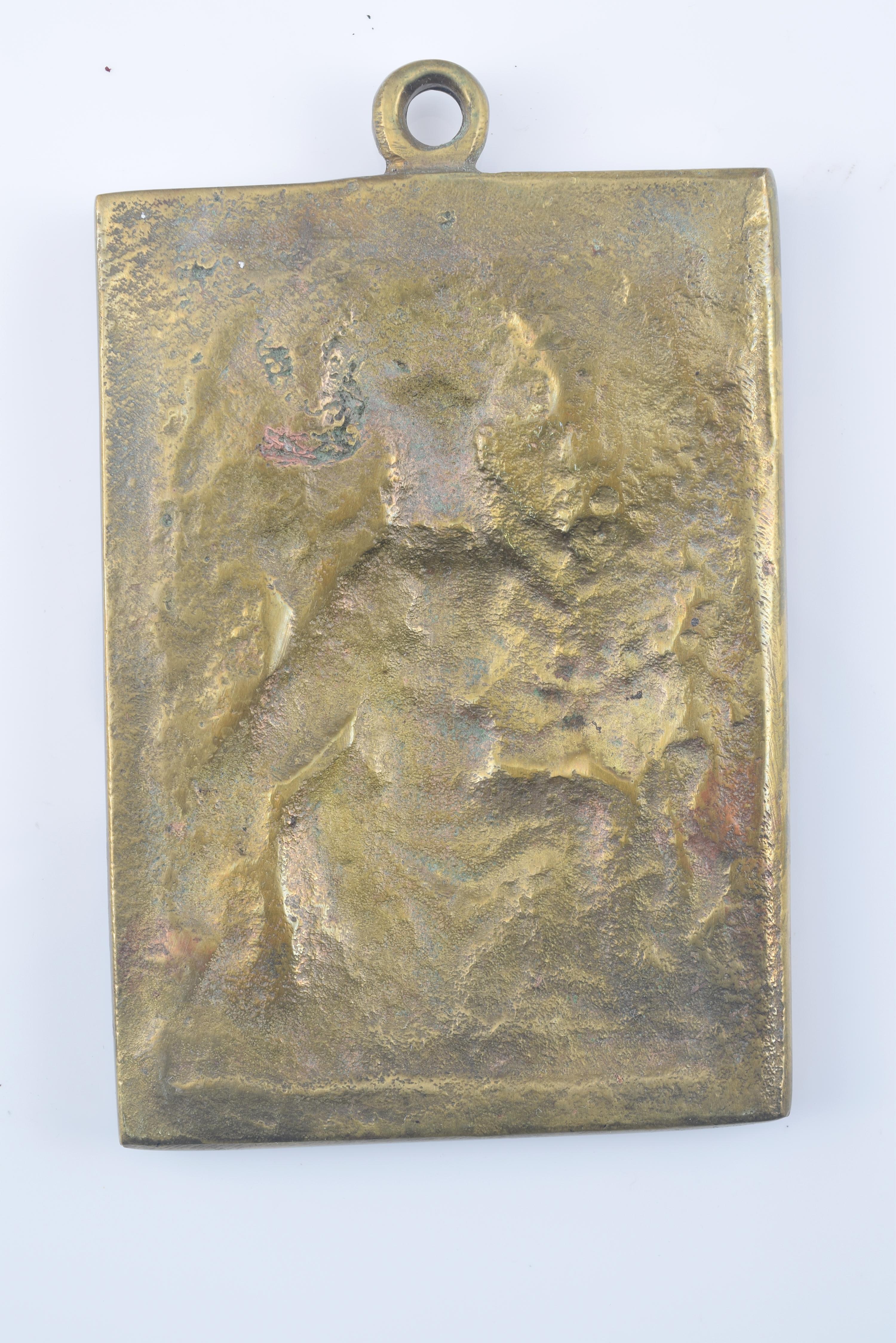 Devotional plaque, Virgin of Montserrat and the Mountain. Bronze. Spanish school, 19th century. 
Devotional plate made of bronze, with a rectangular shape, which has a washer in its upper part and a frame of moldings highlighting a figurative