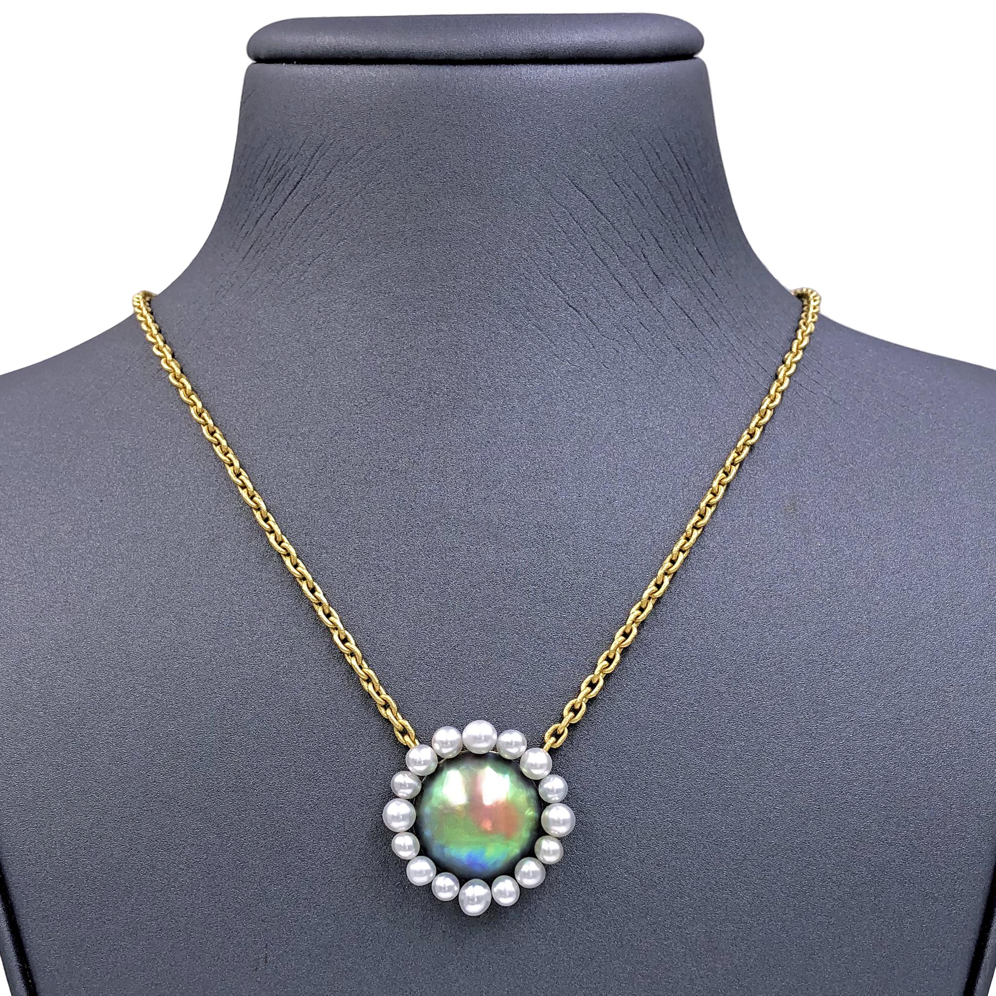 One of a Kind Necklace hand-fabricated by jewelry maker Devta Doolan in a combination of signature-finished 22k yellow gold and platinum showcasing an incredibly rare, extraordinary abalone pearl surrounded by sixteen fine South Sea keshi pearls.