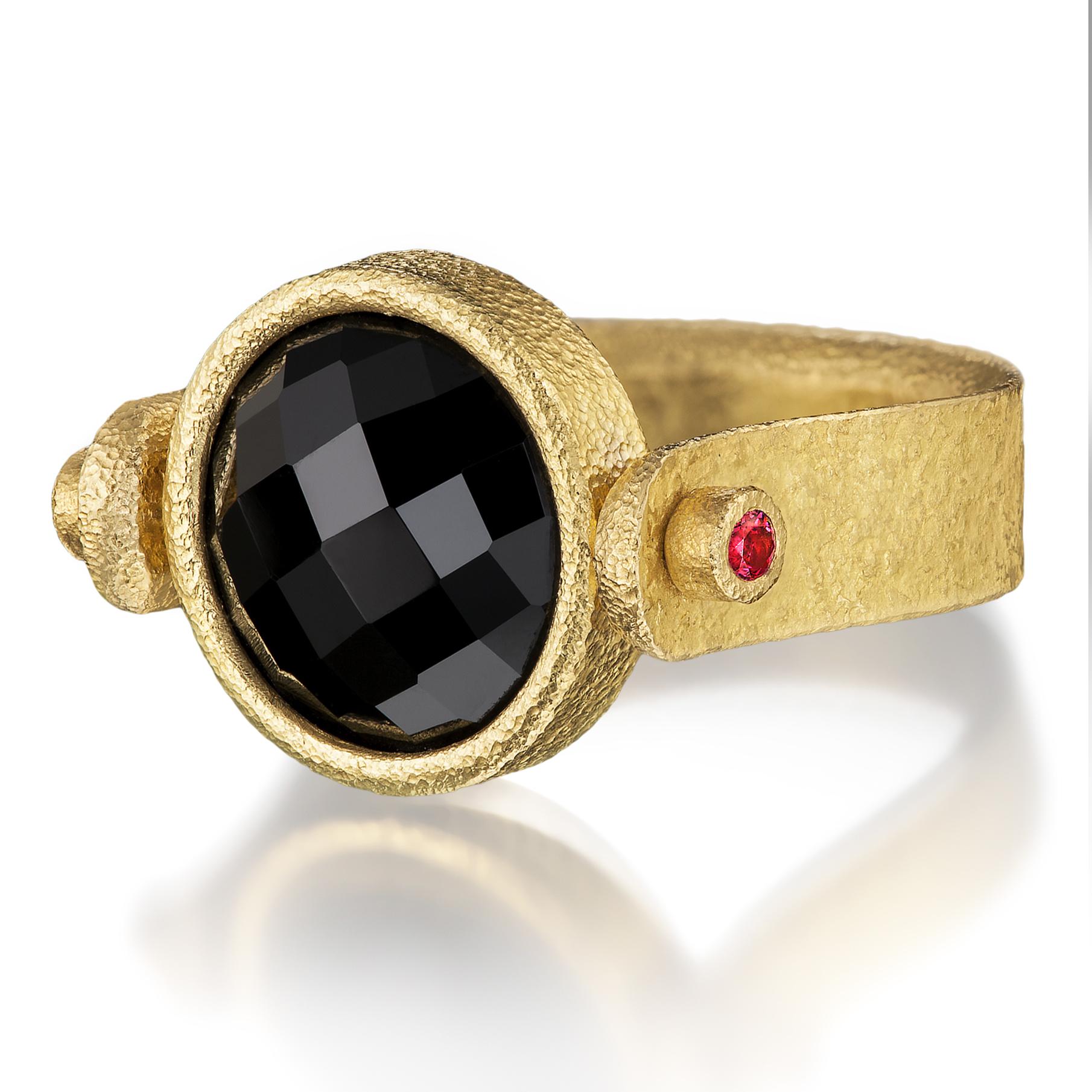 One of a Kind Flip Ring by renowned jewelry maker Devta Doolan featuring a beautiful, faceted checker-cut black spinel wrapped in Devta's luxurious signature-finished 22k yellow gold, and attached to 360 degree rotating rods bezel-set with a
