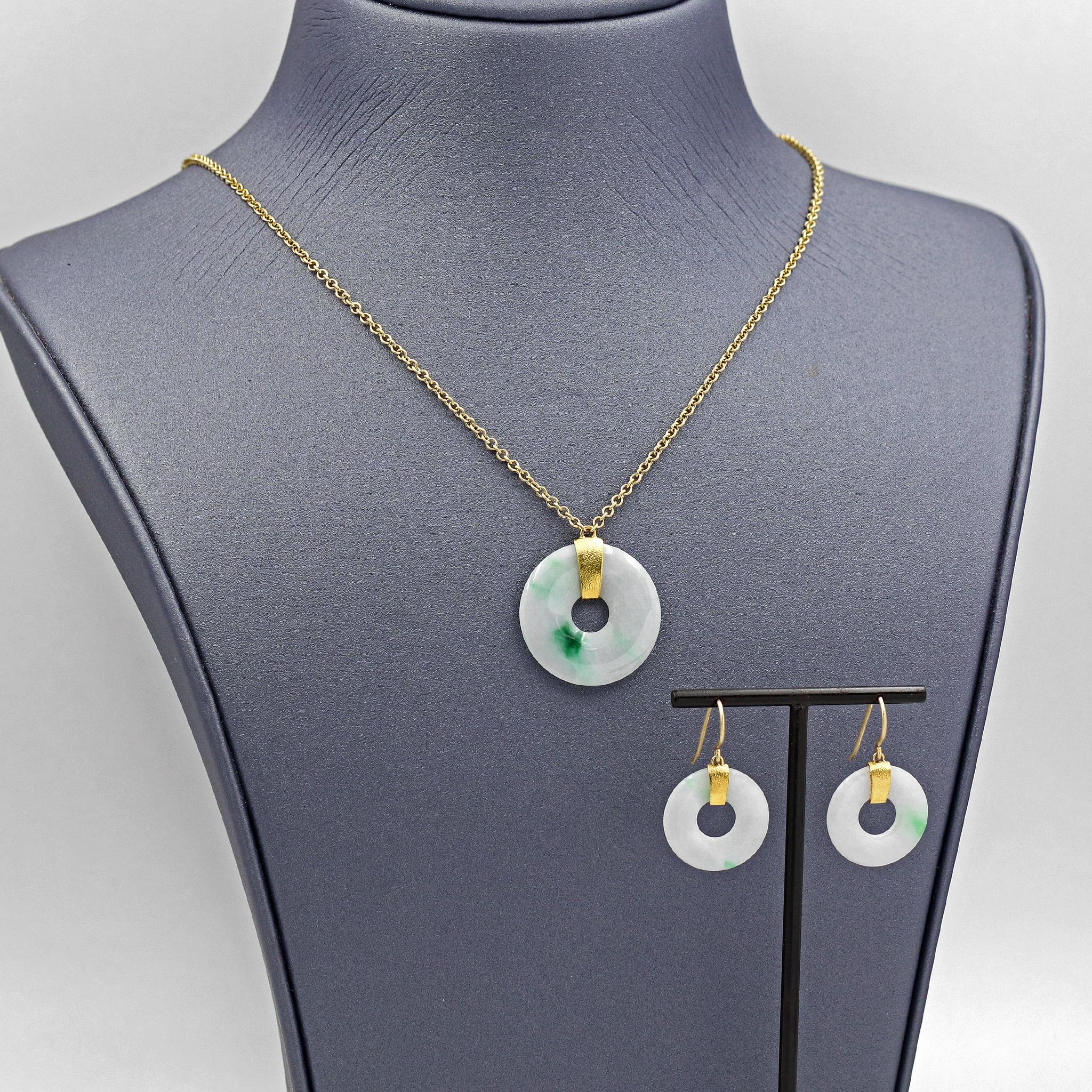 One of a Kind Necklace and Earring Suite hand-fabricated in signature-finished 22k yellow gold by jewelry maker Devta Doolan featuring three matched, A grade, Untreated Burmese Jadeite Discs and respectively accented with an eighteen inch 18k yellow