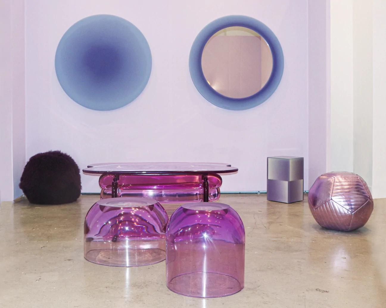 Designed to be a table or a stool, the dew drop comes in a variety of colors and heights. The artwork is exciting, using technique further play upon resin’s ability to effect light with volume and color. The thickness changes closer to the top