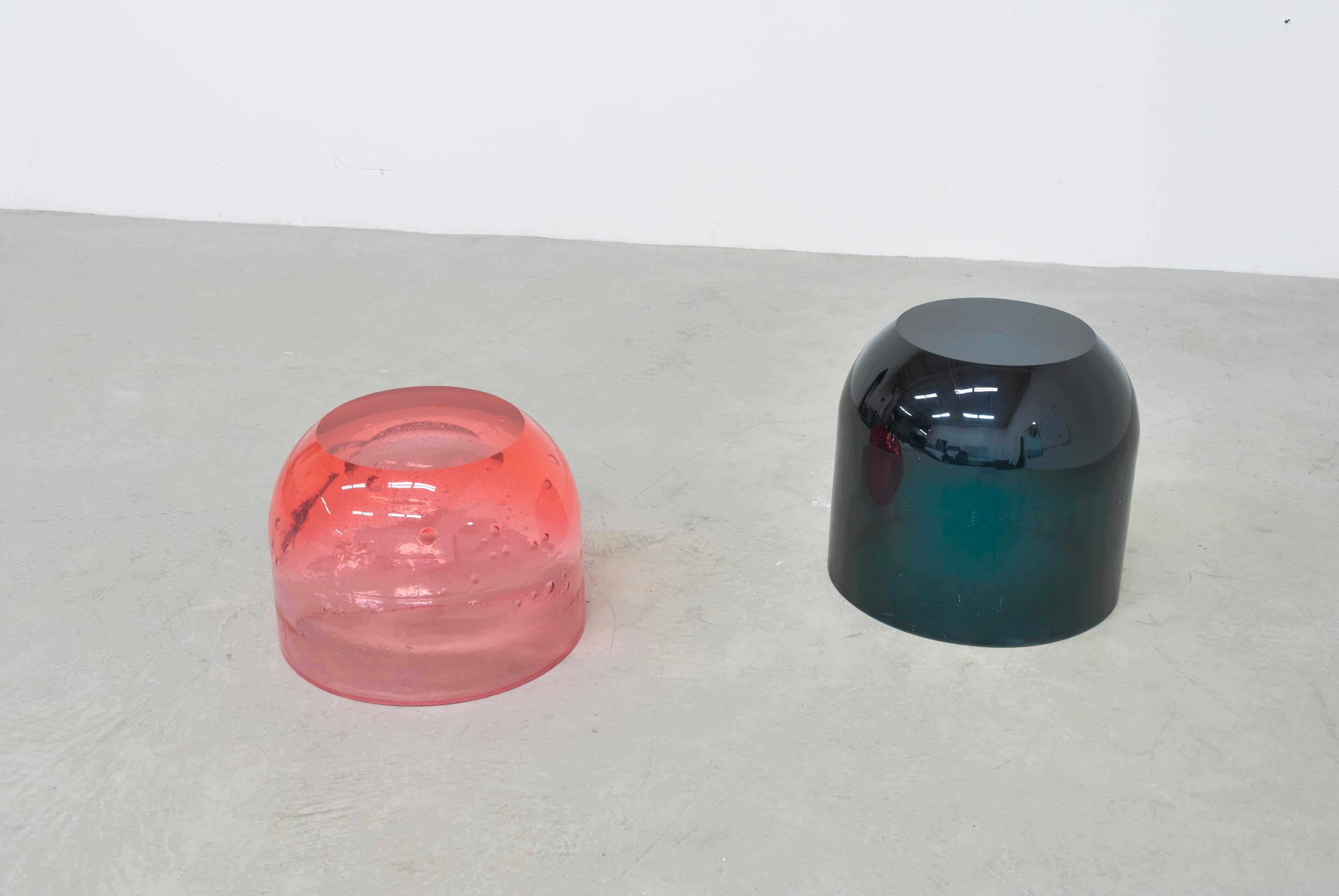 The Dew series further plays with resin’s ability to effect light with volume and color.

Designed to be a table or a stool the Dew Drops come in a variety of colors and heights.