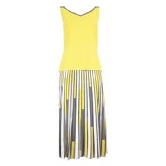 D.Exterior Conjunto Falda Plisada Amarillo y Gris Talla S