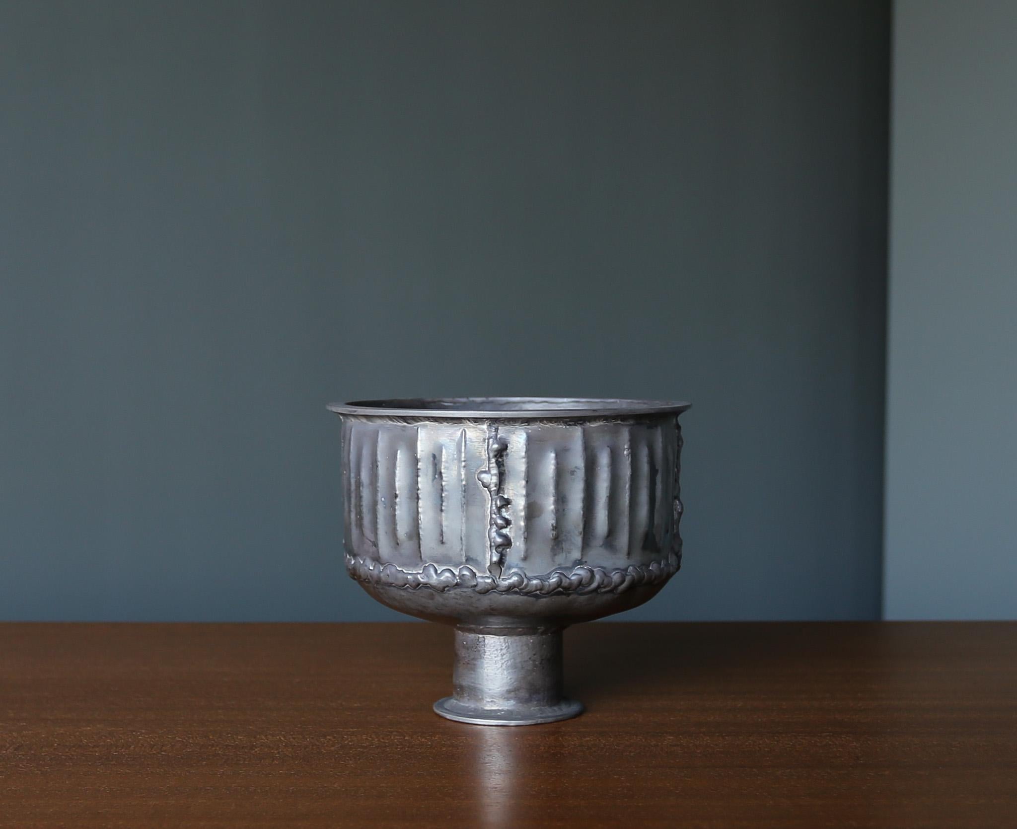 Dextra Frankel Welded 800 Silver Footed Bowl, California, c.1970.  This piece is signed to the bottom. 