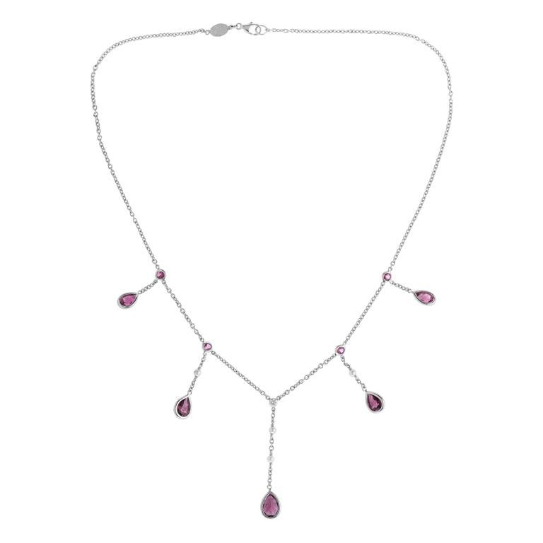 DEAKIN & FRANCIS, Piccadilly Arcade, London

This one of a kind 18ct white gold rubellite, cultured pearl and diamond drop necklace truly is special. Comprised of 9 rubellites, 4 cultured pearls and 1 central diamond. The perfect necklace for