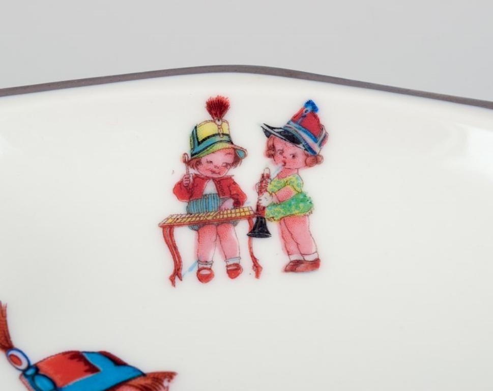 D. A. Limoges, Francia. Calienta bebés de porcelana. Tapón con cara de niño. mediados del siglo XX en venta