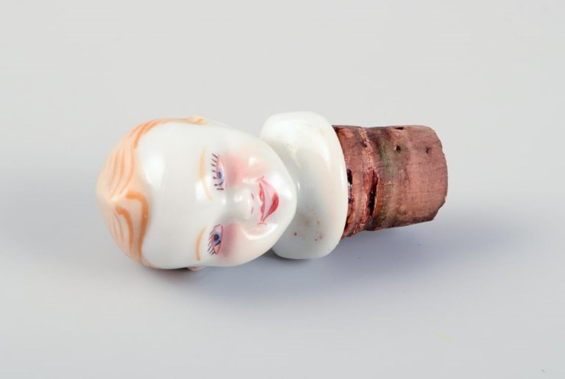 D. A. Limoges, Francia. Calienta bebés de porcelana. Tapón con cara de niño. Porcelana en venta