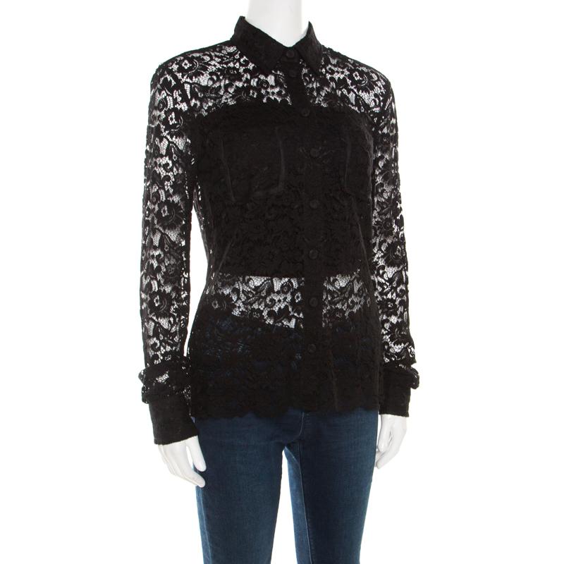 Simply delightful, this shirt from D&G is a must buy! The black creation is made of a viscose blend and features a floral lace design. It flaunts sharp collars, front button fastenings, long sleeves and scalloped bottom trims. It will look great