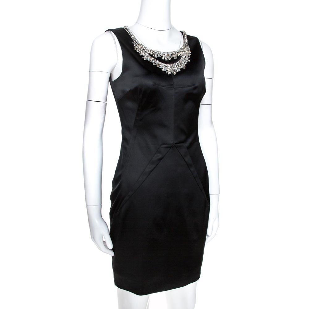 Add the right blend of sheen and bling to your party and special event looks wearing this D&G dress that will not go unnoticed. The soft black satin fabric adds that perfect sheen to its body-hugging silhouette while the crystal embellishments