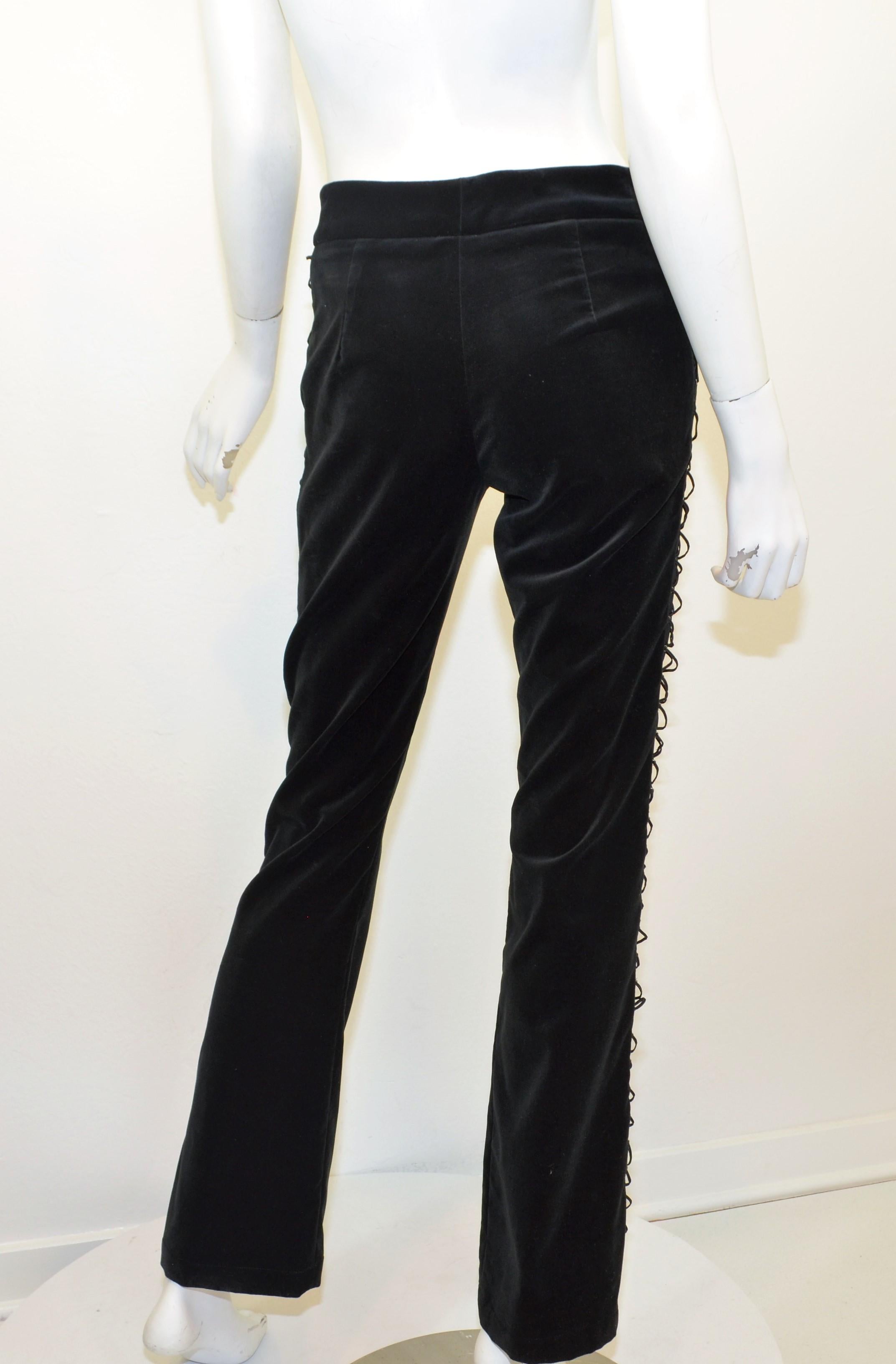 D & G pants are featured in black velvet with lace-up detailing along the satin side panels, zip and hook fastening, and two uncut slip pockets at the front. Pants are in great pre-owned condition with minimal wear and no flaws to